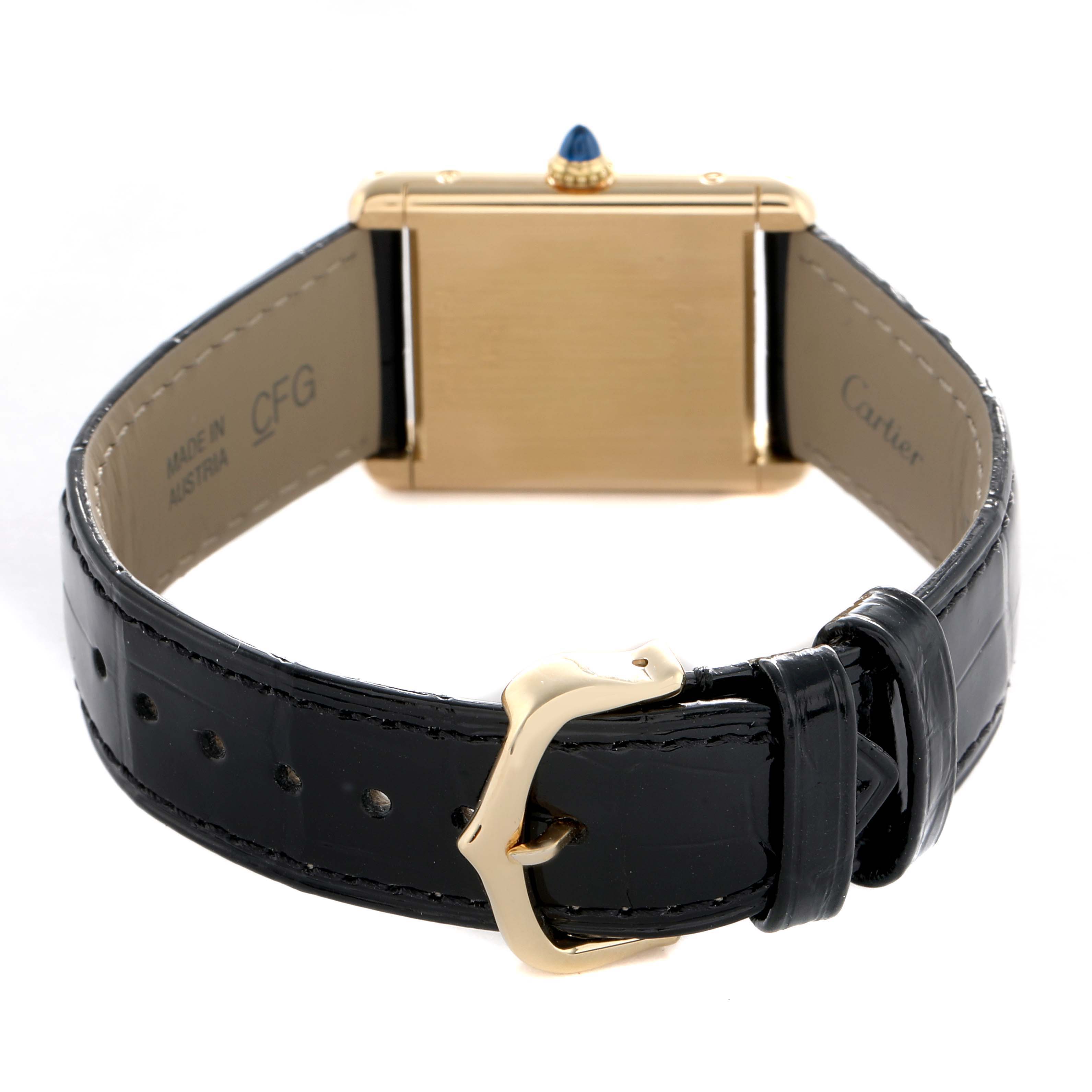 The Cartier Tank Classic Women's Yellow Gold White Dial is shown from the back, highlighting the gold case, leather strap, and clasp.