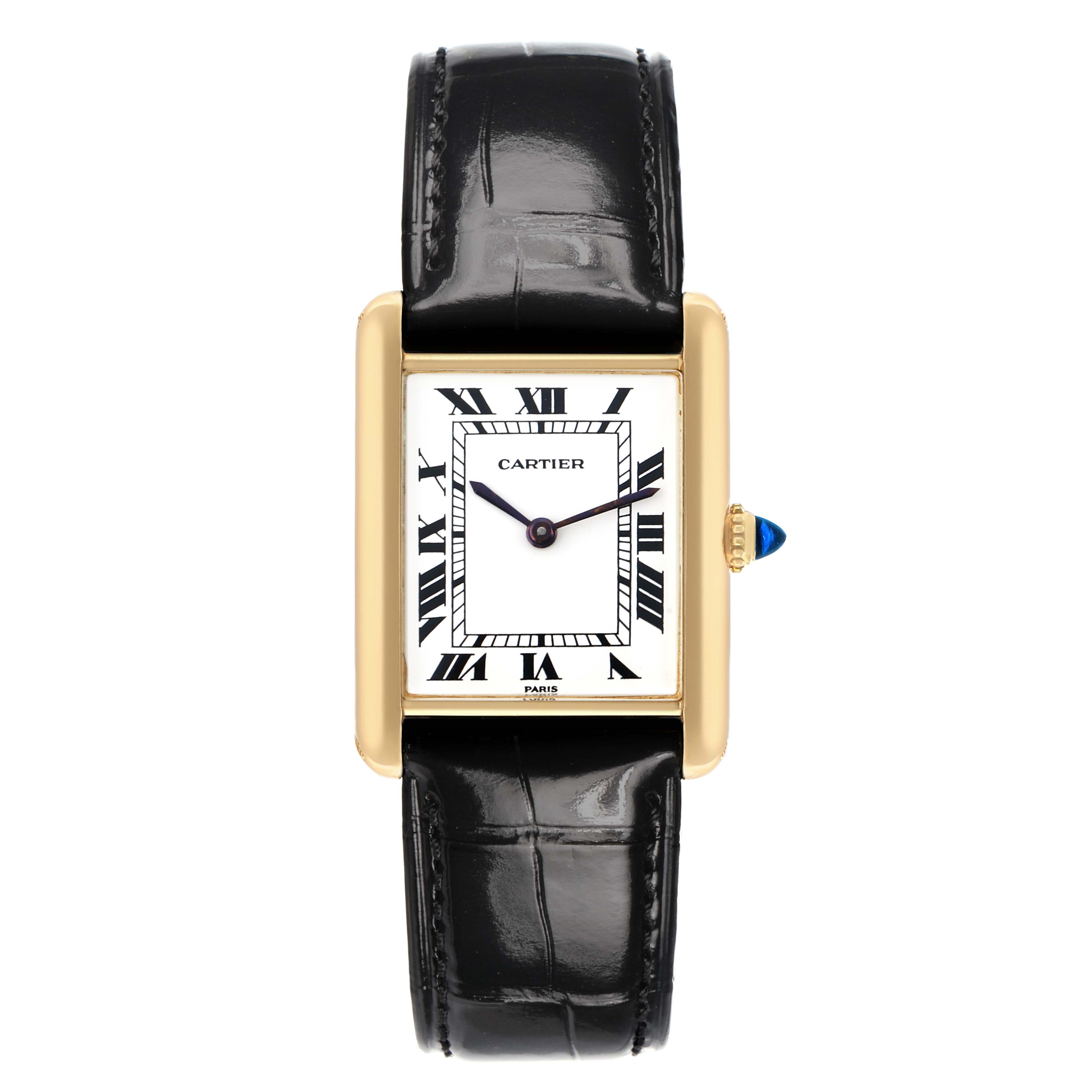 The Cartier Tank Classic Women's Yellow Gold White Dial watch is shown from a front angle, displaying its rectangular face, Roman numerals, and black leather strap.