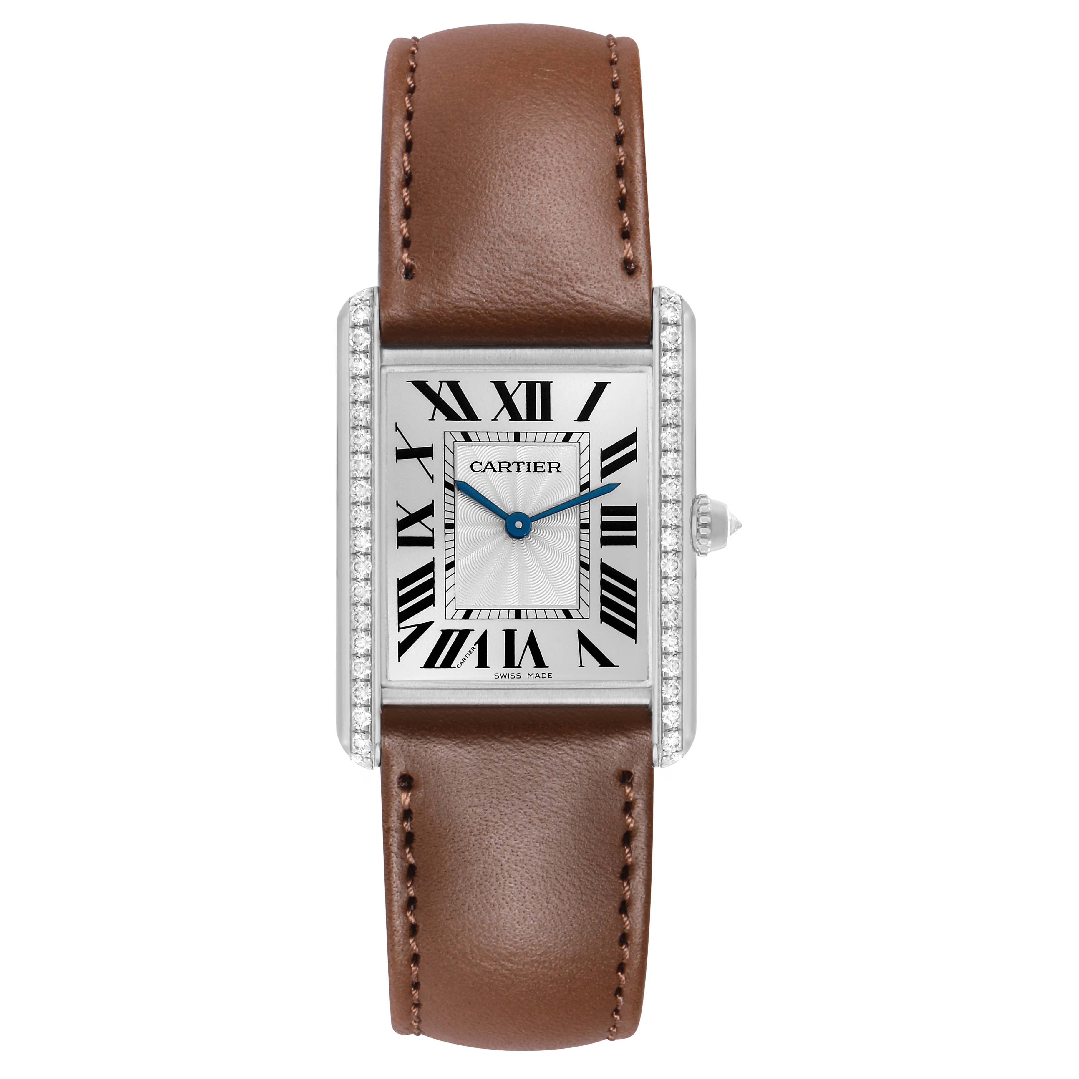 The Cartier Tank Louis WJTA0015 Women's White Gold Silver Dial watch is shown from a top view, displaying the dial, case, leather strap, and crown.