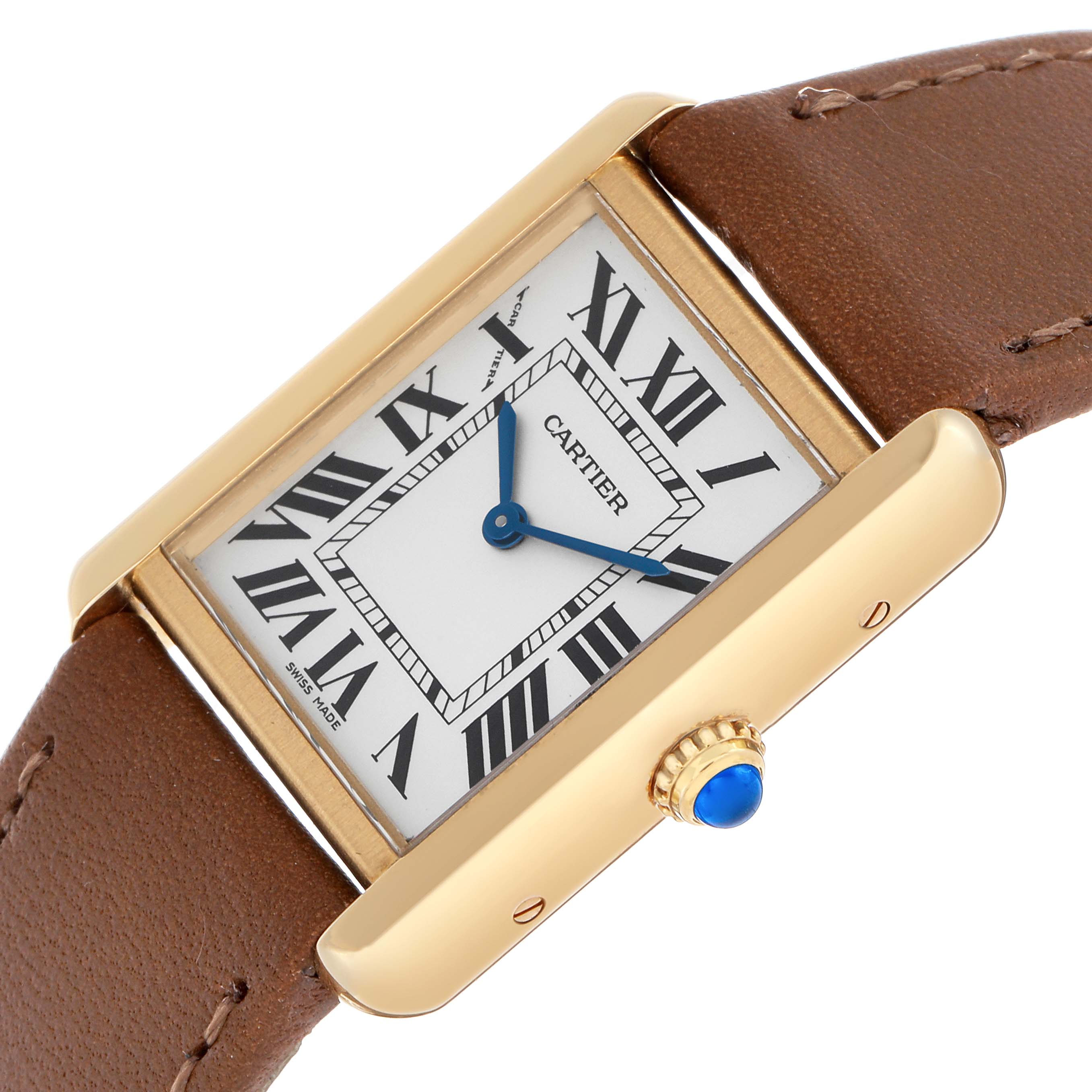 The Cartier Tank Solo W5200002 Women's Yellow Gold Silver Dial watch is shown at an angled close-up, highlighting its gold case, brown leather strap, and blue cabochon crown.