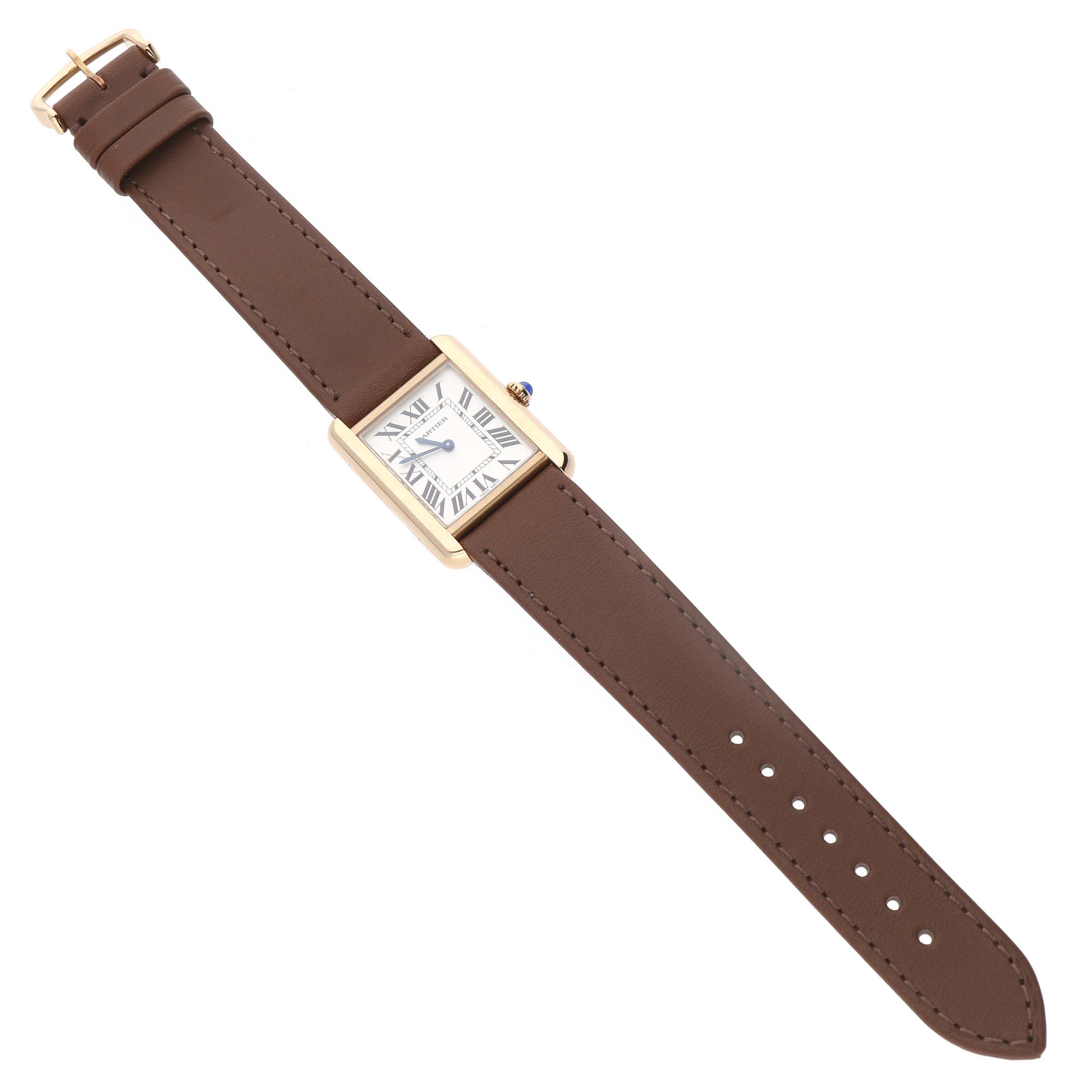 The Cartier Tank Solo W5200002 Women's Yellow Gold Silver Dial watch is shown from a top-down angle, featuring its rectangular case and brown leather strap.