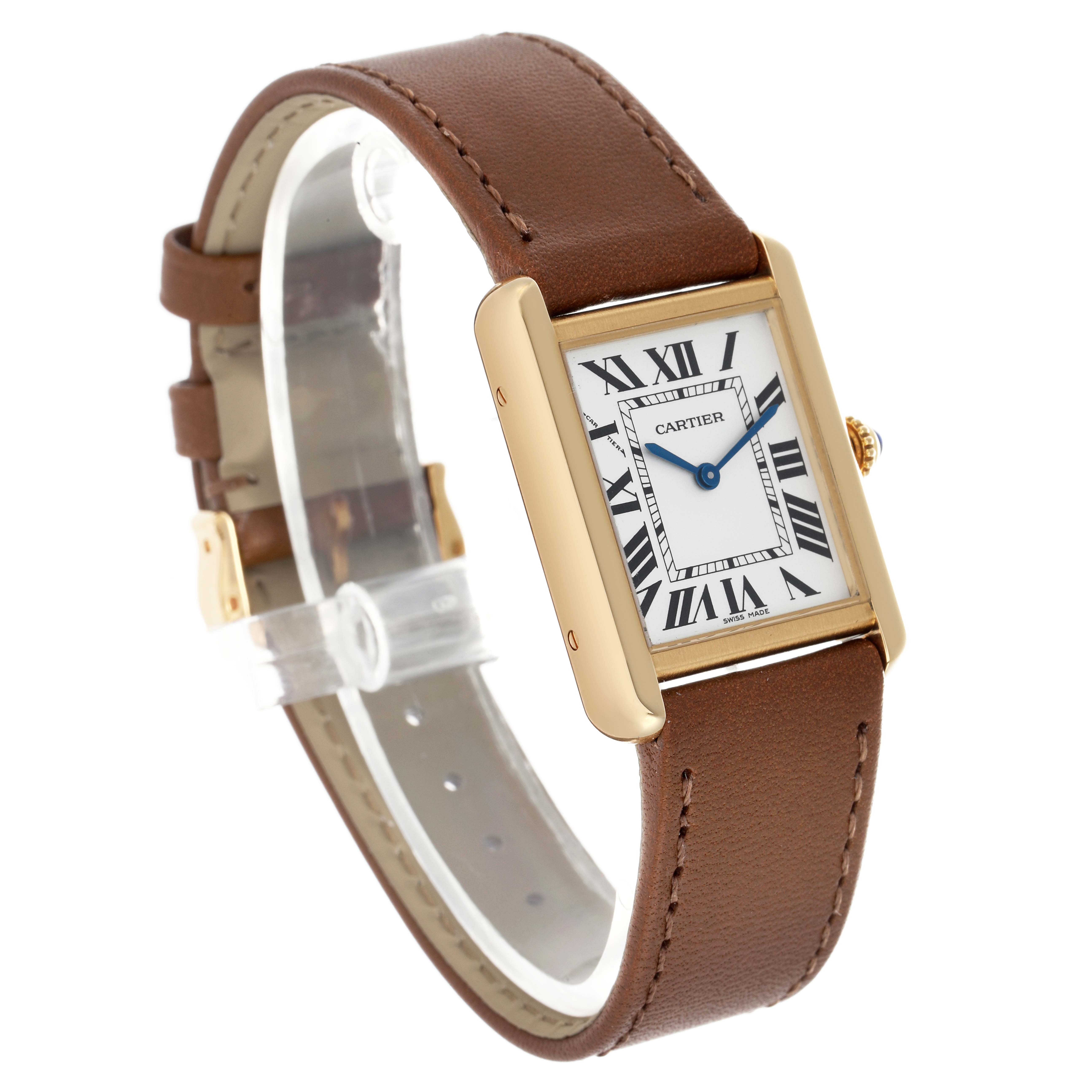 The Cartier Tank Solo W5200002 Women's Yellow Gold Silver Dial watch is shown at a three-quarter angle highlighting its rectangular face, brown leather strap, and gold case.
