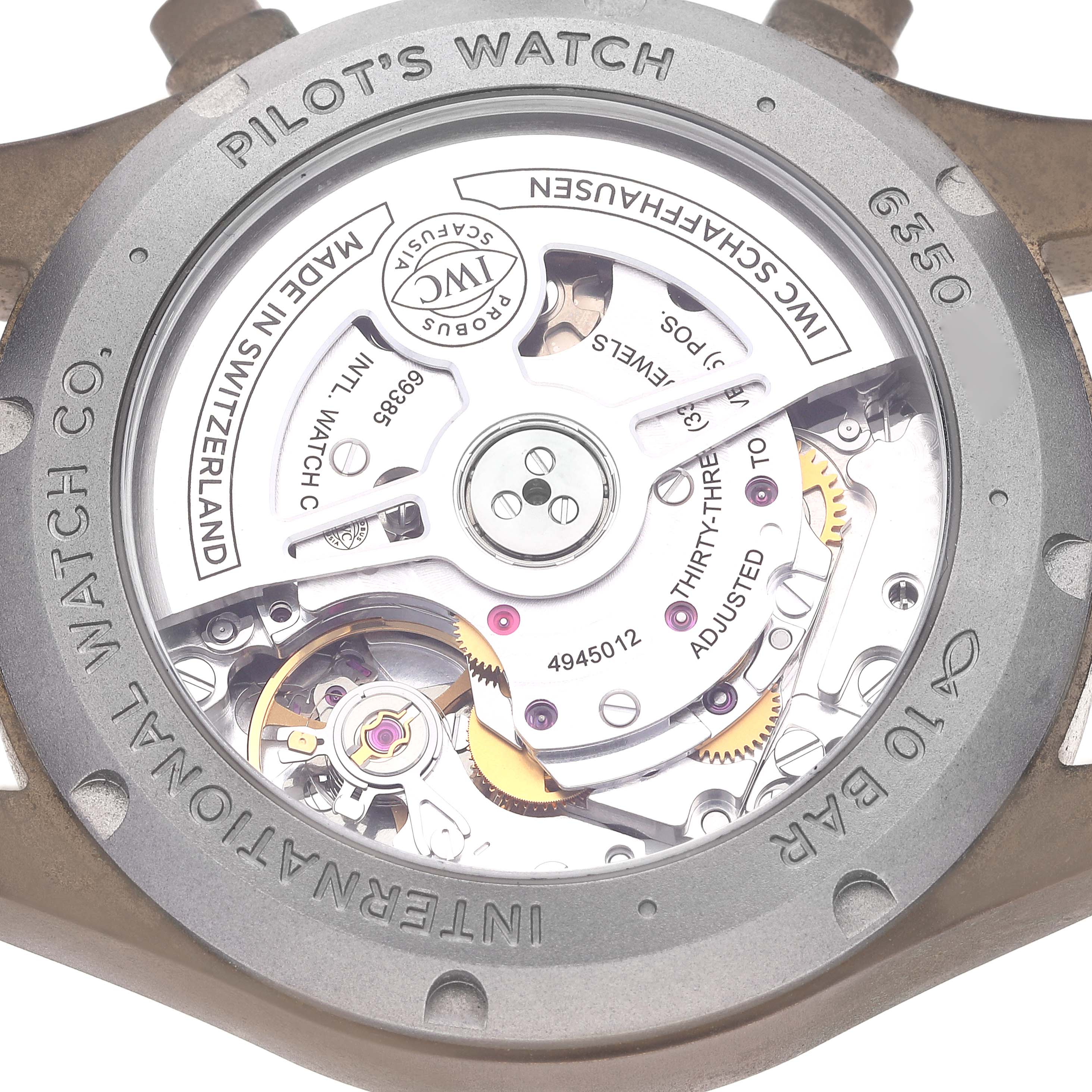 This image shows the back view of the IWC Pilot IW388109 Men's Bronze Blue Dial IW388109 Men's Bronze Blue Dial's Watch, revealing its intricate mechanical movement and inner components.