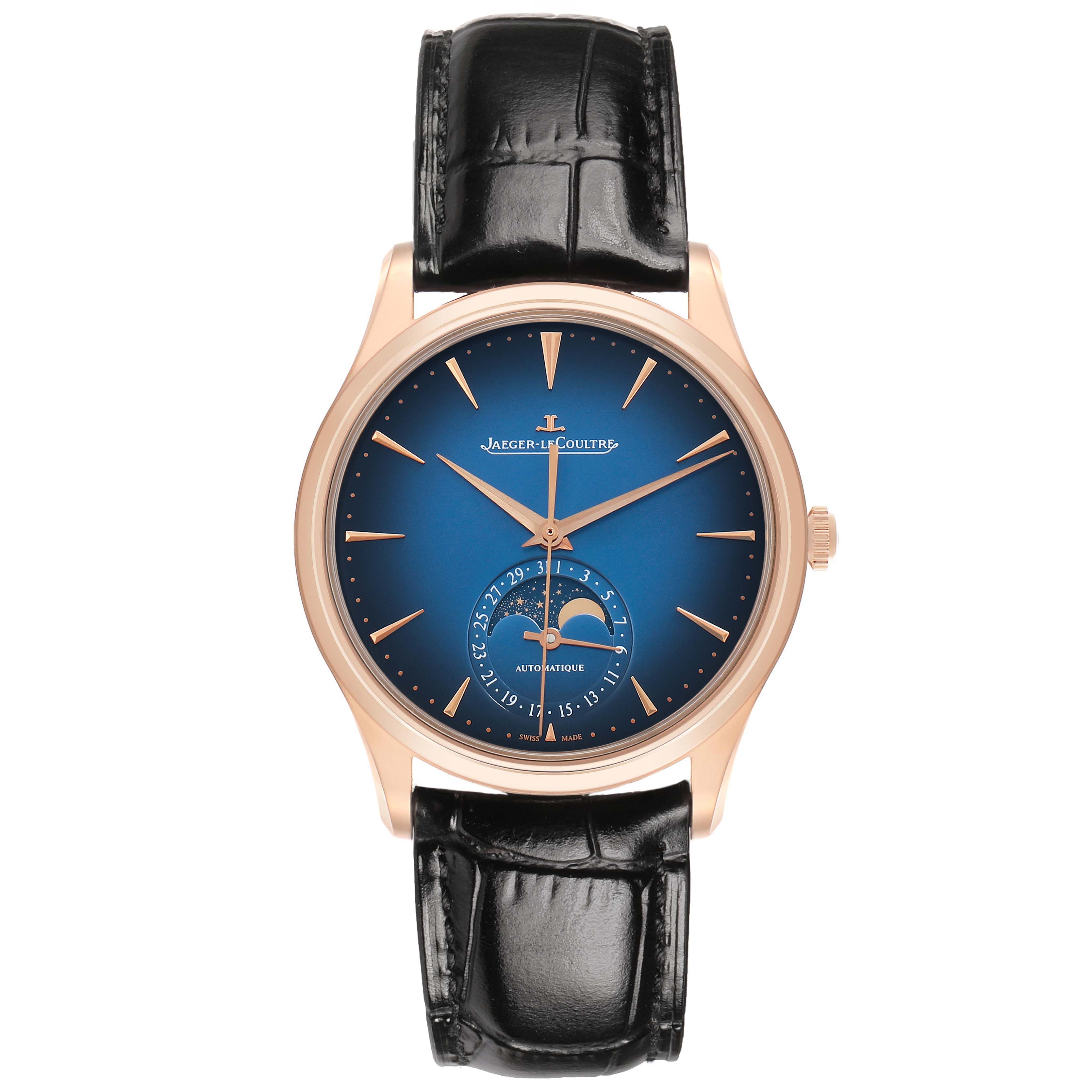 The Jaeger-LeCoultre Master watch is shown from a front view, highlighting its blue dial, moon phase, and black leather strap.
