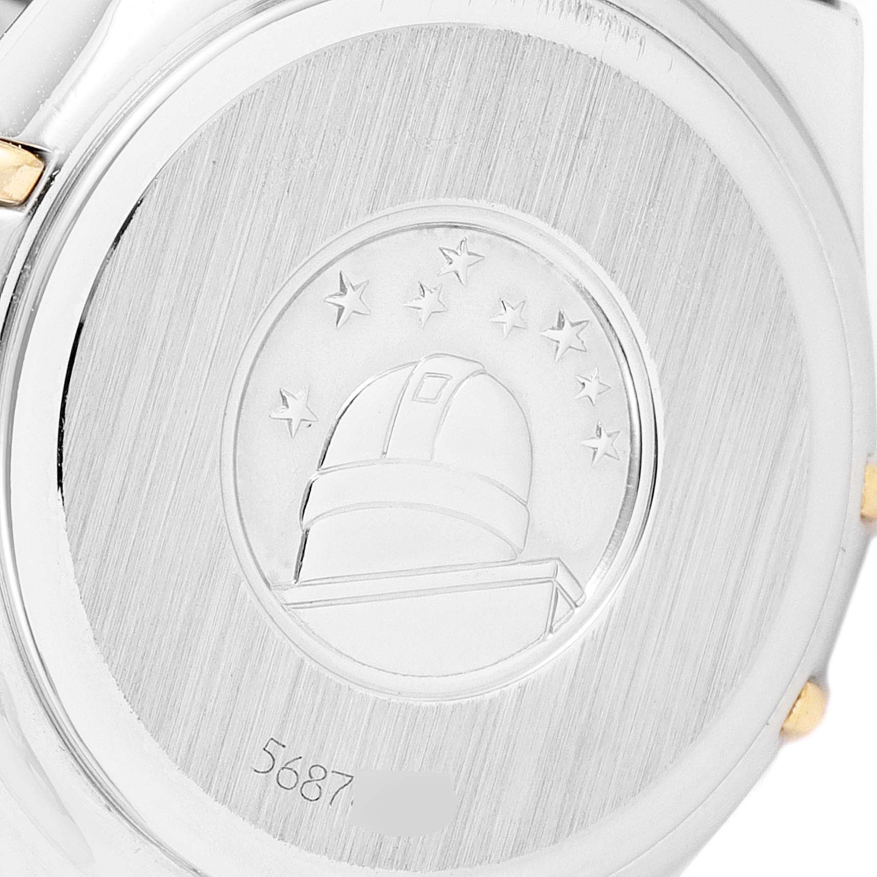 This image shows the back case of the Omega Women's Steel and Gold (two tone) Mother of Pearl Dial Women's Steel and Gold (two tone) Mother of Pearl Dial Constellation My Choice Steel 18k Rose Gold Diamond Ladies Watch.