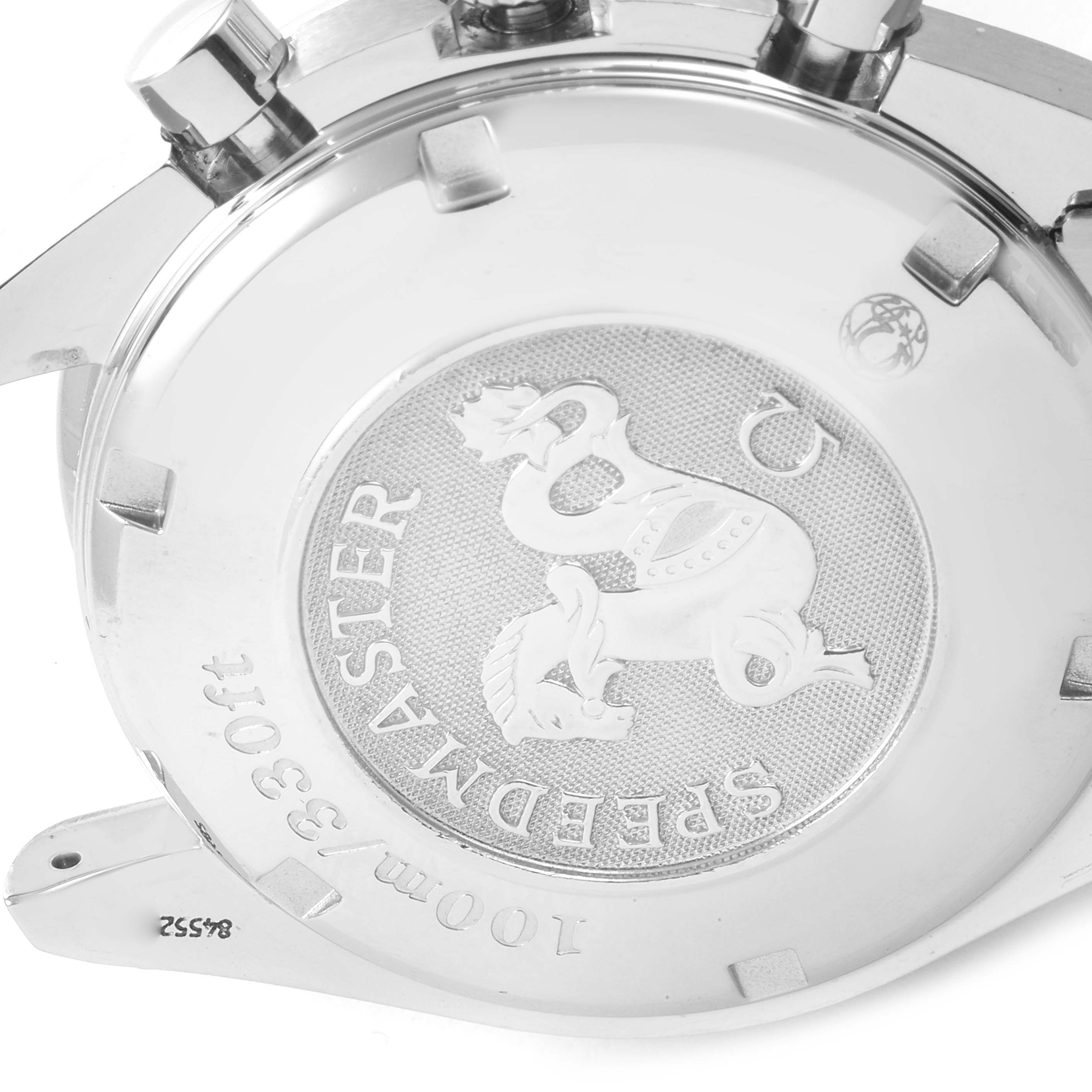 This image shows the engraved case back of an Omega Speedmaster 3220.50.00 Men
s Stainless Steel Black Dial 3220.50.00 Men
s Stainless Steel Black Dial model watch, displaying the emblem and text details.