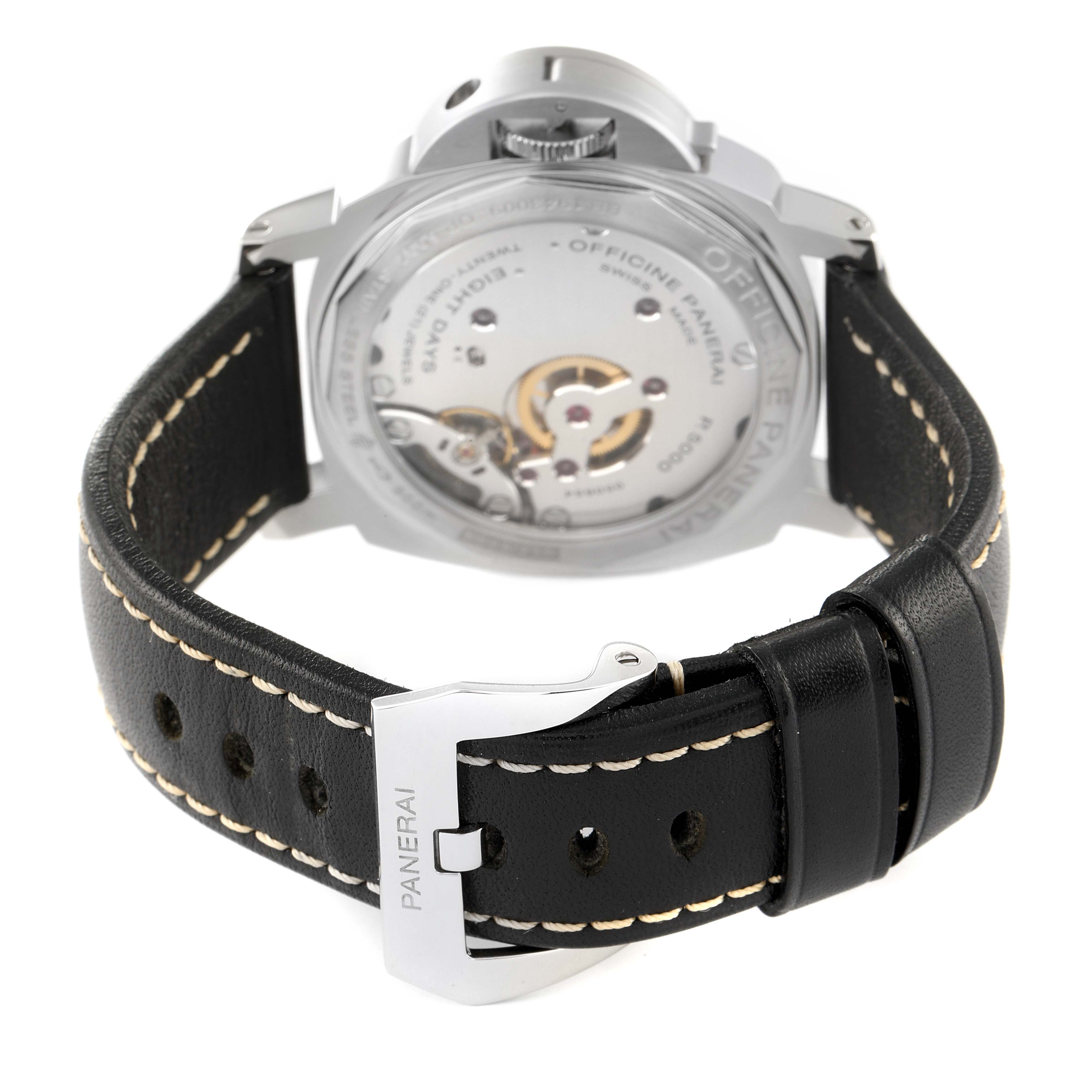 The image shows the back view of a Panerai Luminor PAM00560 Men
s Stainless Steel Black Dial PAM00560 Men
s Stainless Steel Black Dial watch with its leather strap and exposed movement.