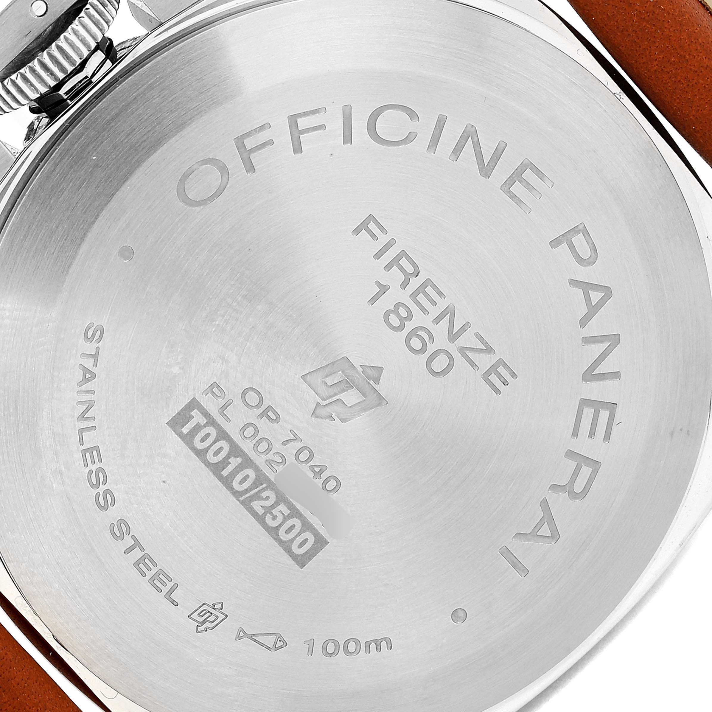 The image shows the back case of a Panerai Luminor PAM01005 Men
s Stainless Steel Black Dial PAM01005 Men
s Stainless Steel Black Dial watch, featuring engravings and part of the leather strap.