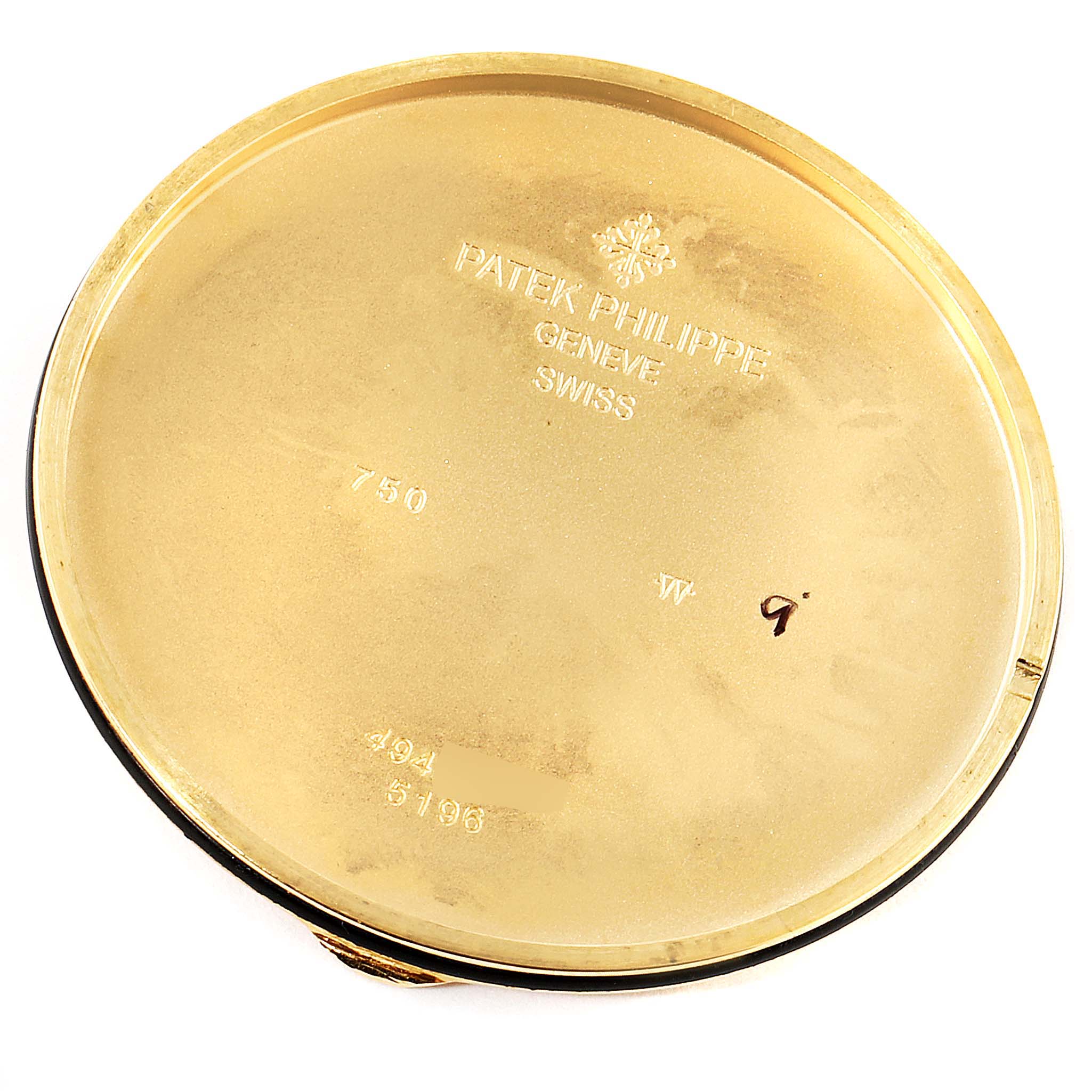 This image shows the back case of a Patek Philippe Calatrava 5196J Men's Yellow Gold Silver Dial 5196J Men's Yellow Gold Silver Dial watch, featuring engravings with brand details.