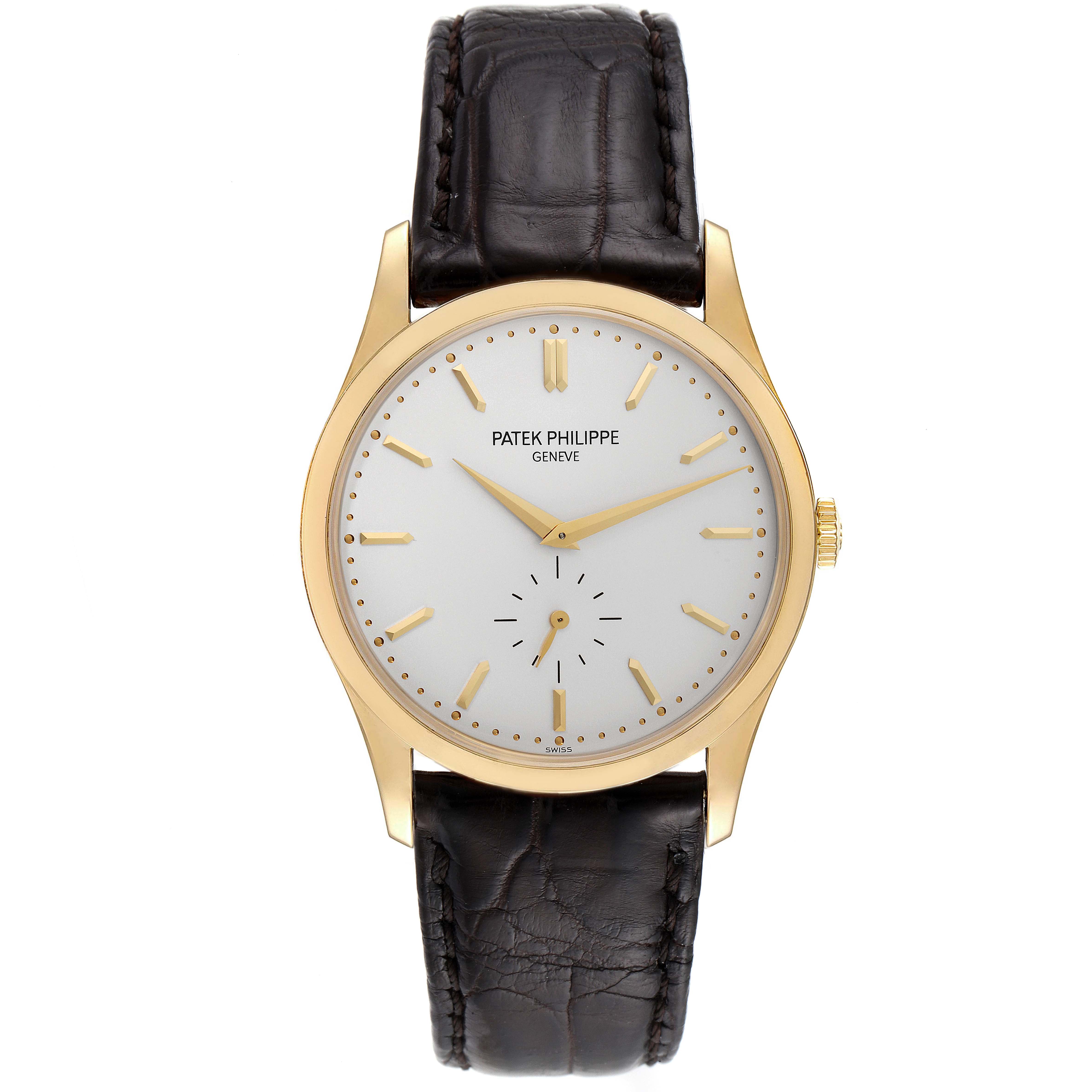 This image shows a front view of the Patek Philippe Calatrava 5196J Men's Yellow Gold Silver Dial 5196J Men's Yellow Gold Silver Dial watch with a brown leather strap and gold case.