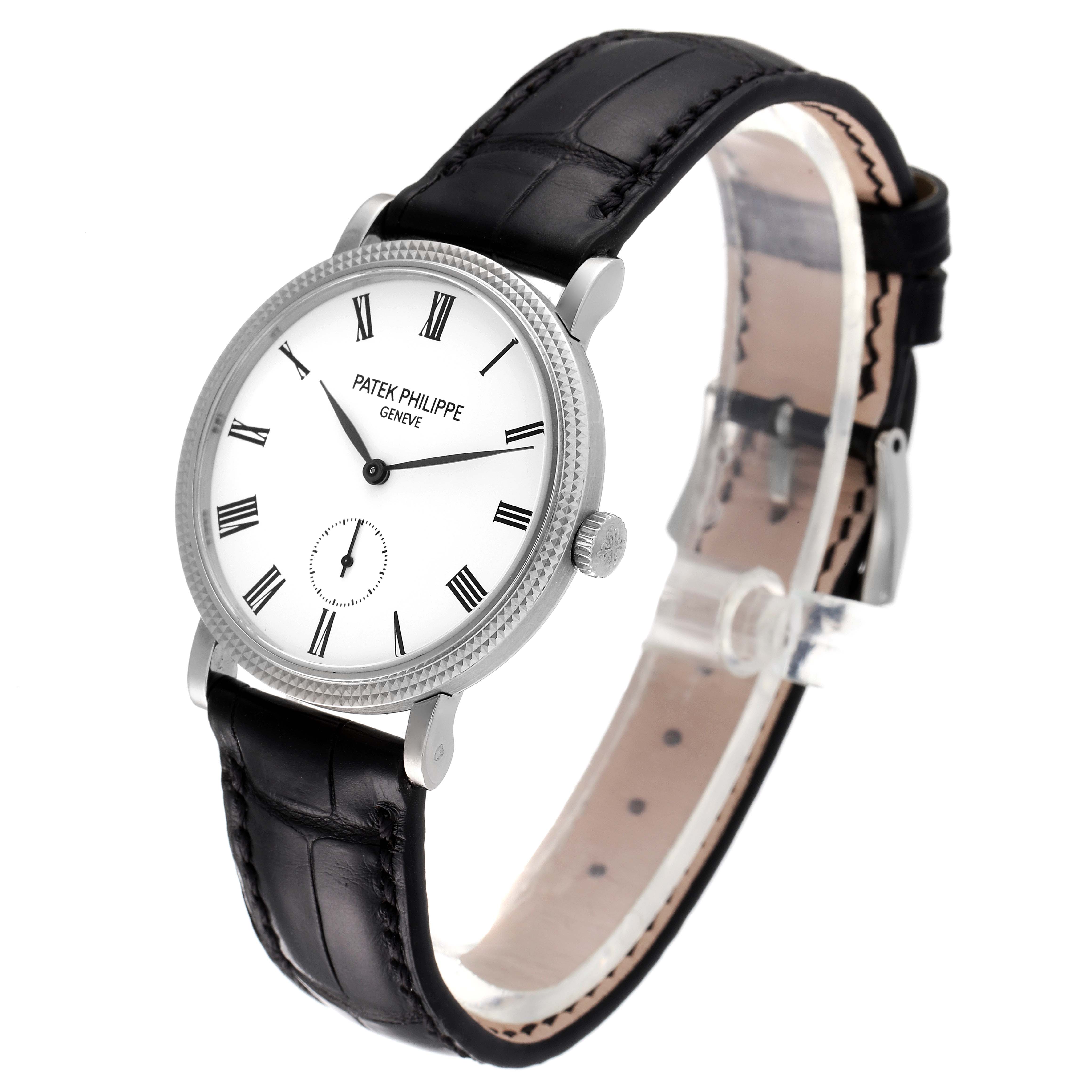 The Patek Philippe Calatrava 7119G Women's White Gold White Dial 7119G Women's White Gold White Dial watch is shown in a three-quarter view, highlighting the face, crown, and leather strap.