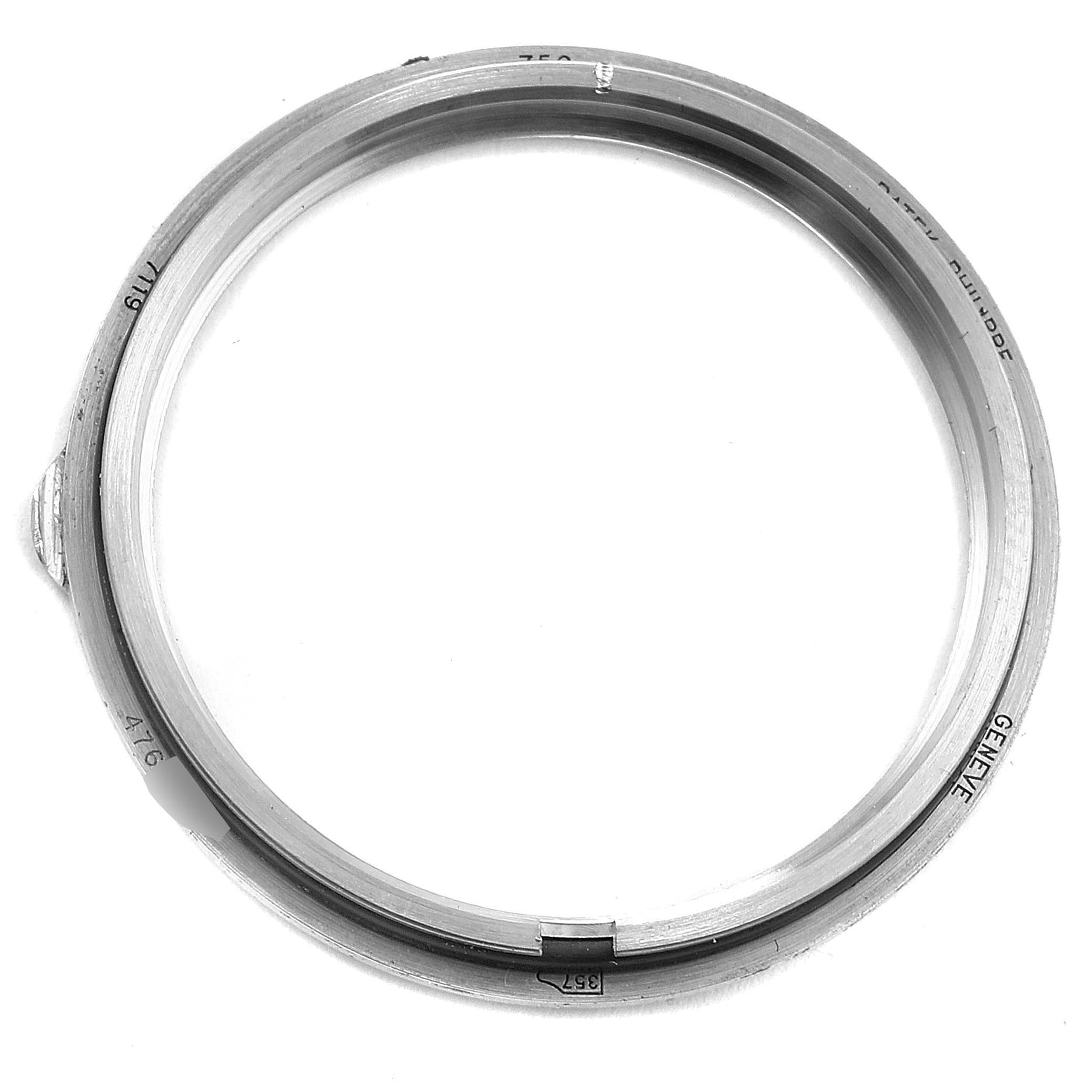 This image shows the bezel or case ring of a Patek Philippe Calatrava 7119G Women's White Gold White Dial 7119G Women's White Gold White Dial watch.