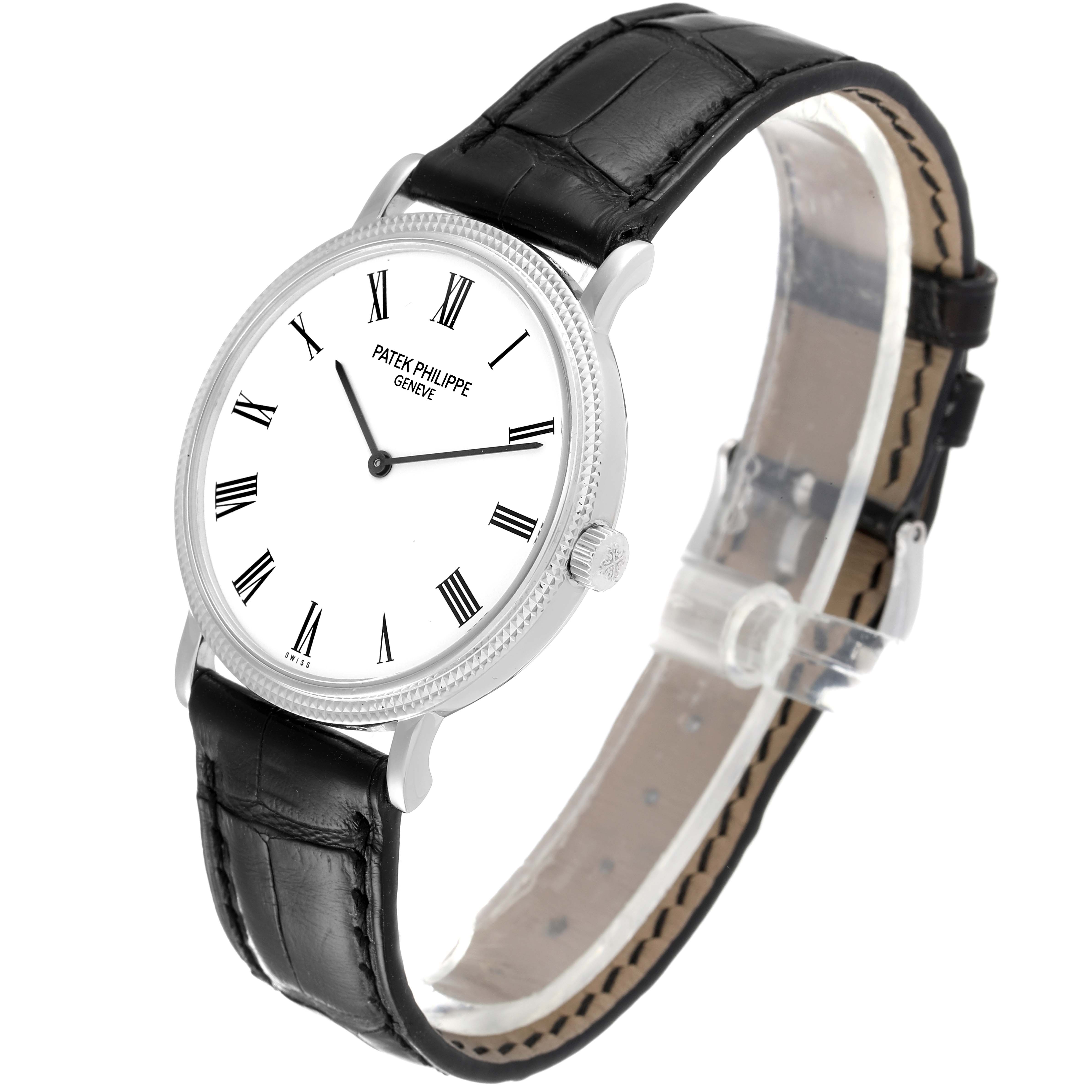 The image shows a Patek Philippe Calatrava 5120G Men's White Gold White Dial 5120G Men's White Gold White Dial watch angled from the front-left side, displaying the face, crown, and strap.