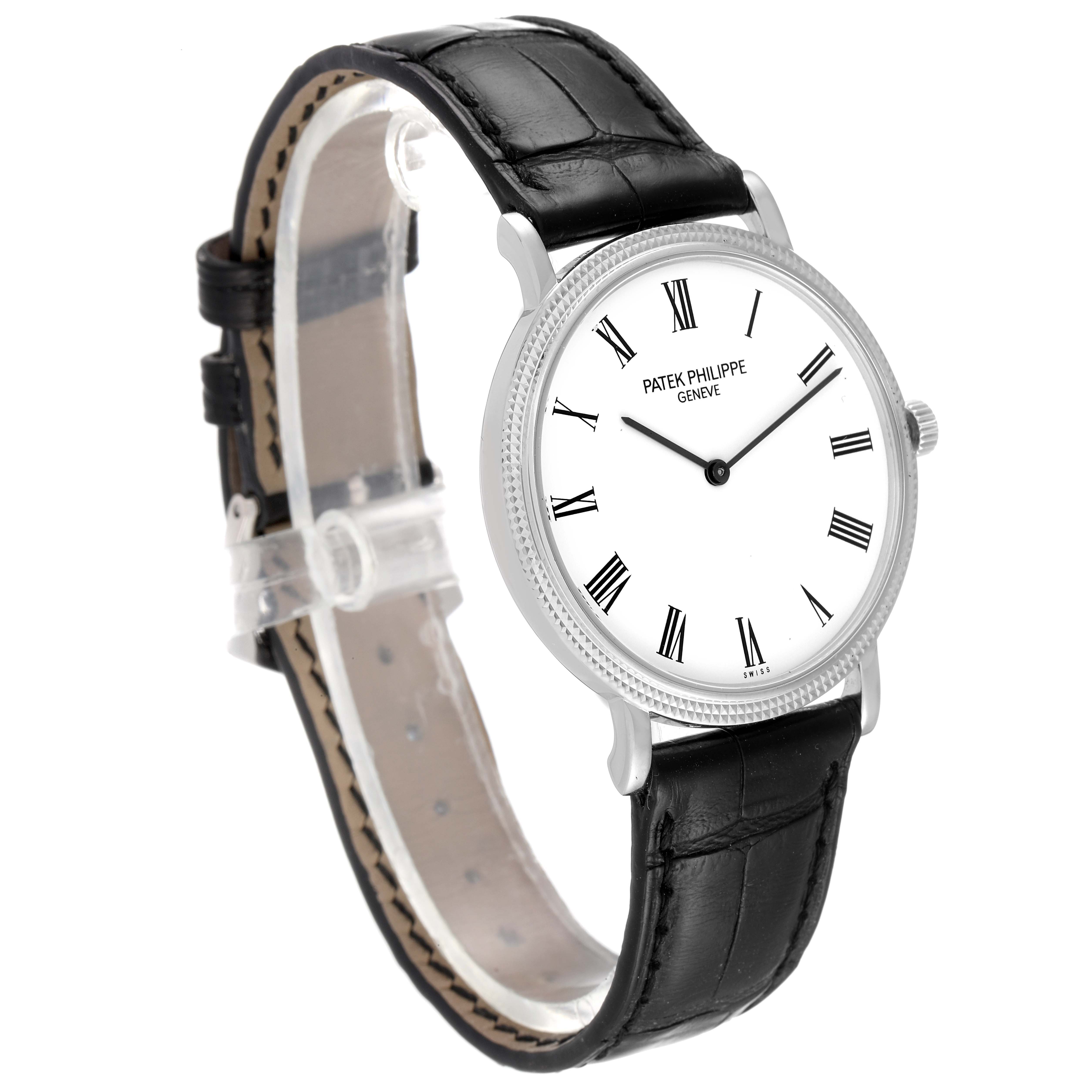 This image shows a side angle view of a Patek Philippe Calatrava 5120G Men's White Gold White Dial 5120G Men's White Gold White Dial watch, displaying its dial, case, and leather strap.