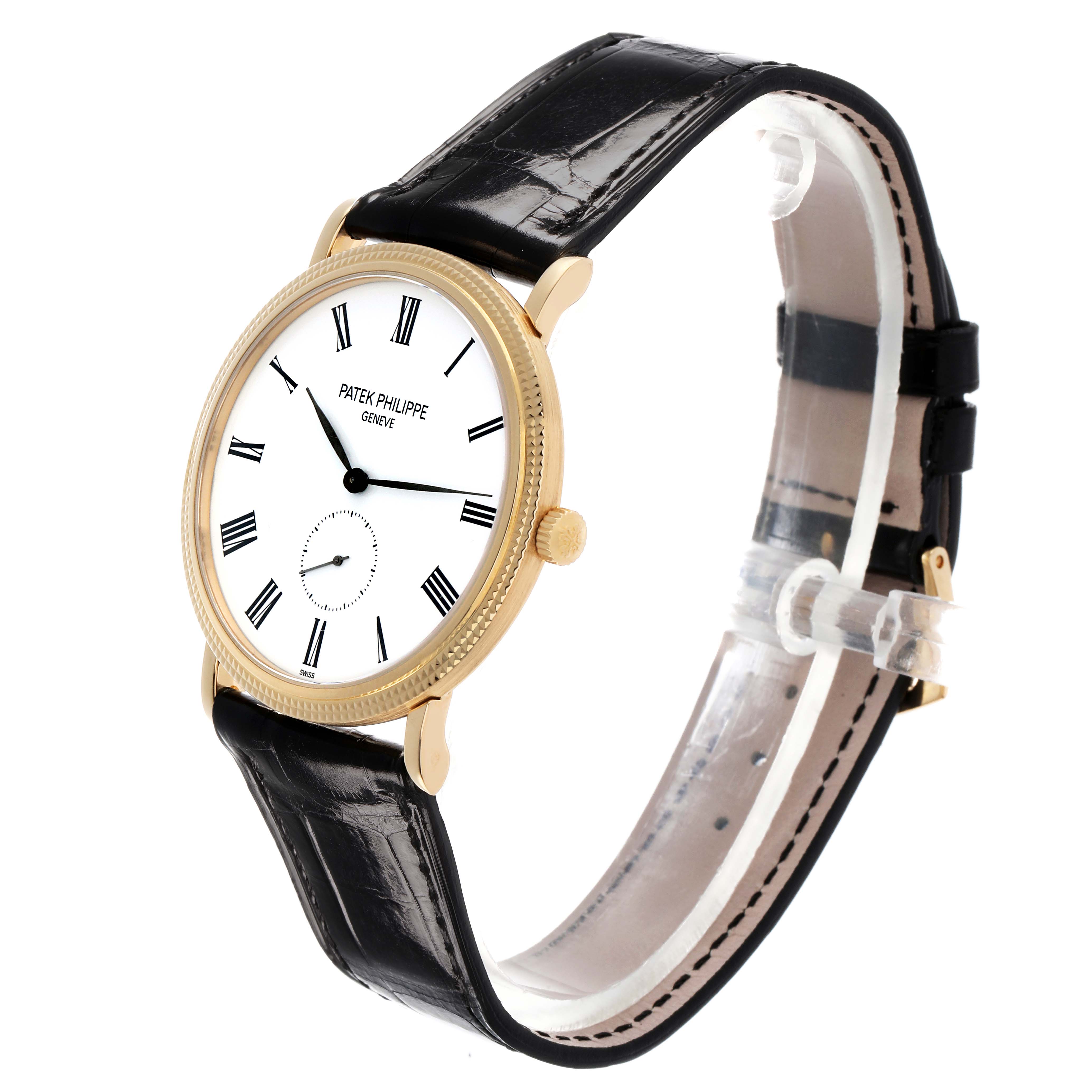 The Patek Philippe Calatrava 5119J-001 Men's Yellow Gold White Dial watch is shown at a three-quarter angle, displaying the face, bezel, and black leather strap.