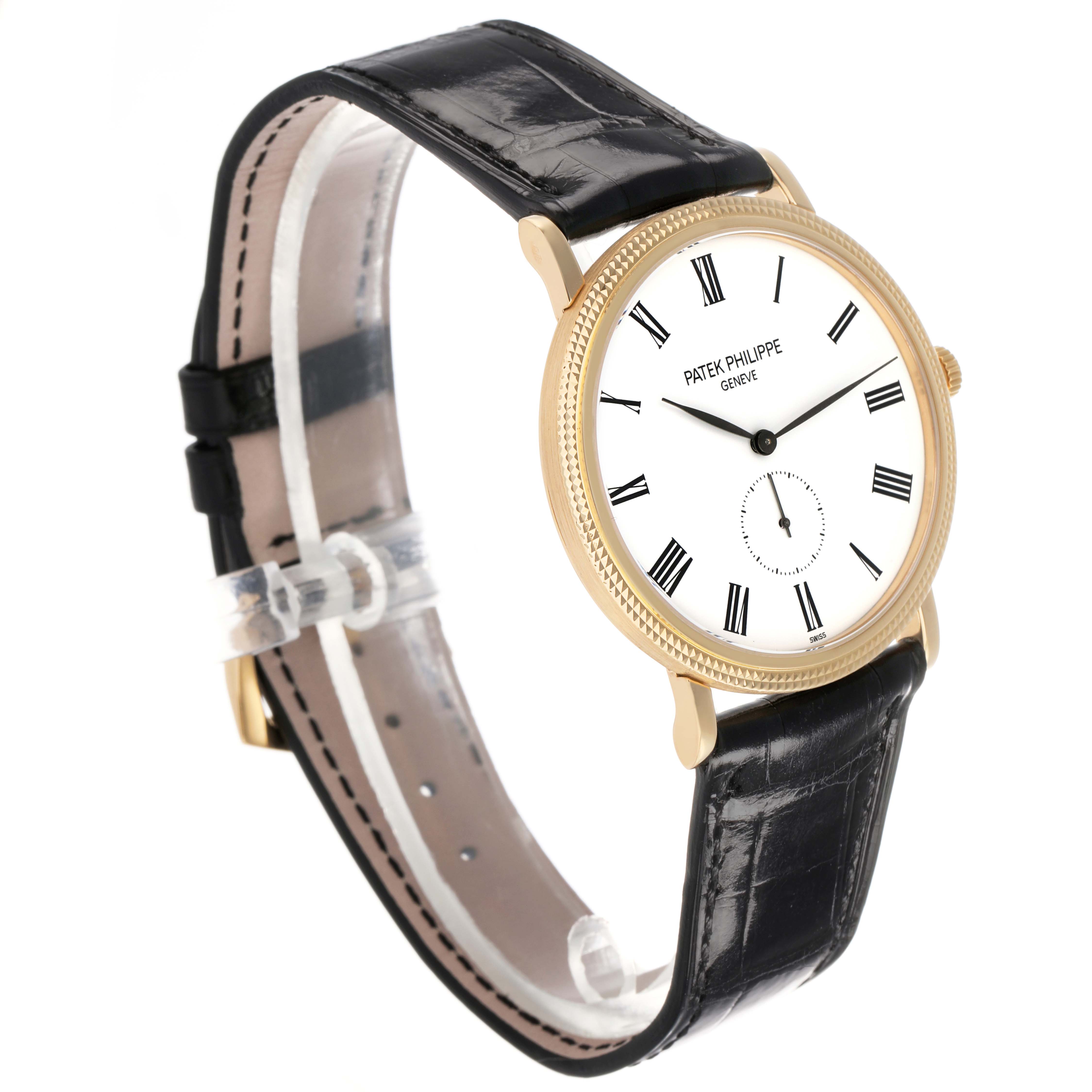 The Patek Philippe Calatrava 5119J-001 Men's Yellow Gold White Dial watch is shown at a slight angle, highlighting the dial, case, and leather strap.