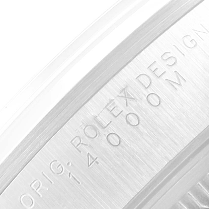 This is a close-up image of the case back engraving on a Rolex Air-King 14000 Men's Stainless Steel Blue Dial 14000 Men's Stainless Steel Blue Dial watch.