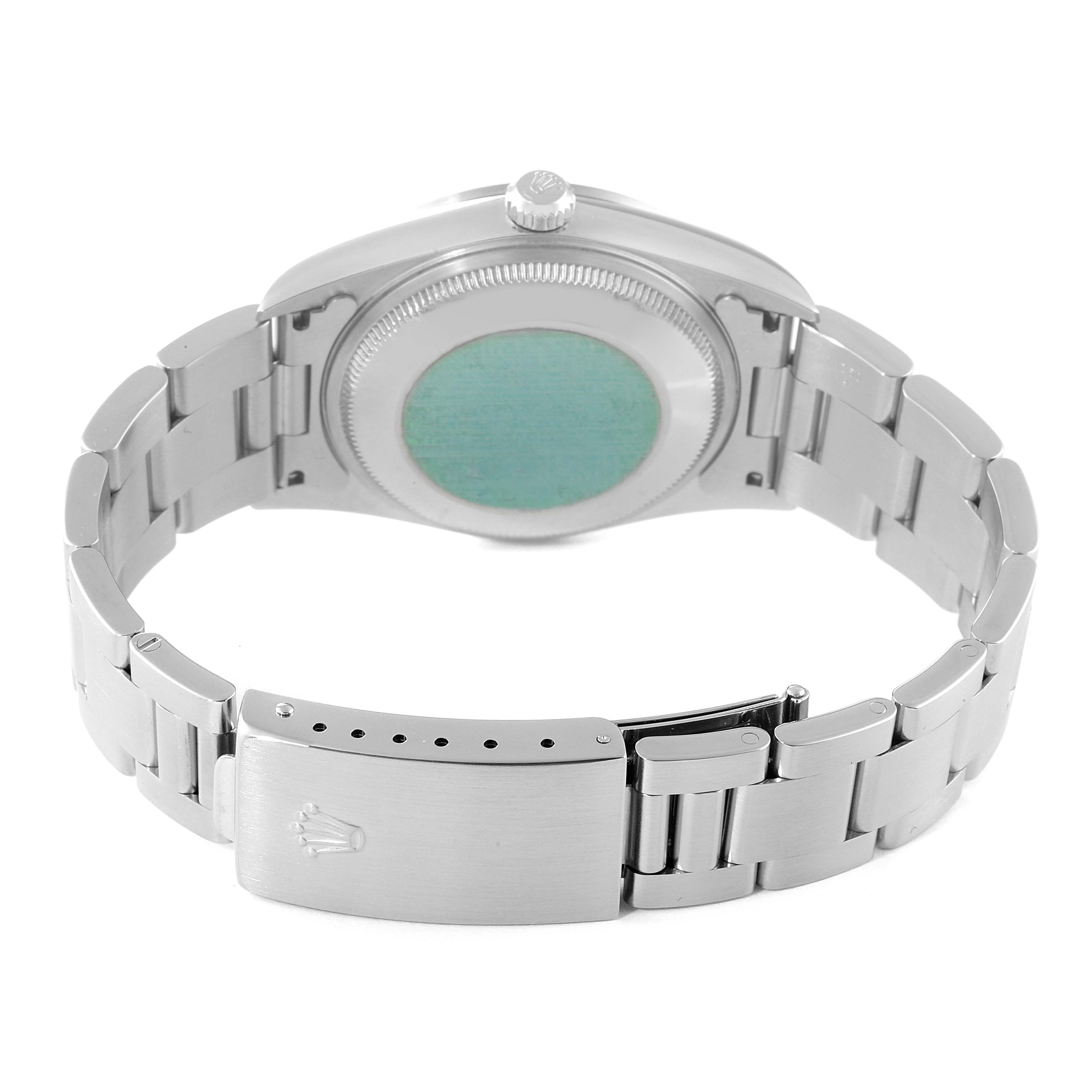 This image shows the back case and bracelet with clasp of the Rolex Air-King 14000 Men's Stainless Steel Blue Dial 14000 Men's Stainless Steel Blue Dial watch from a rear angle.