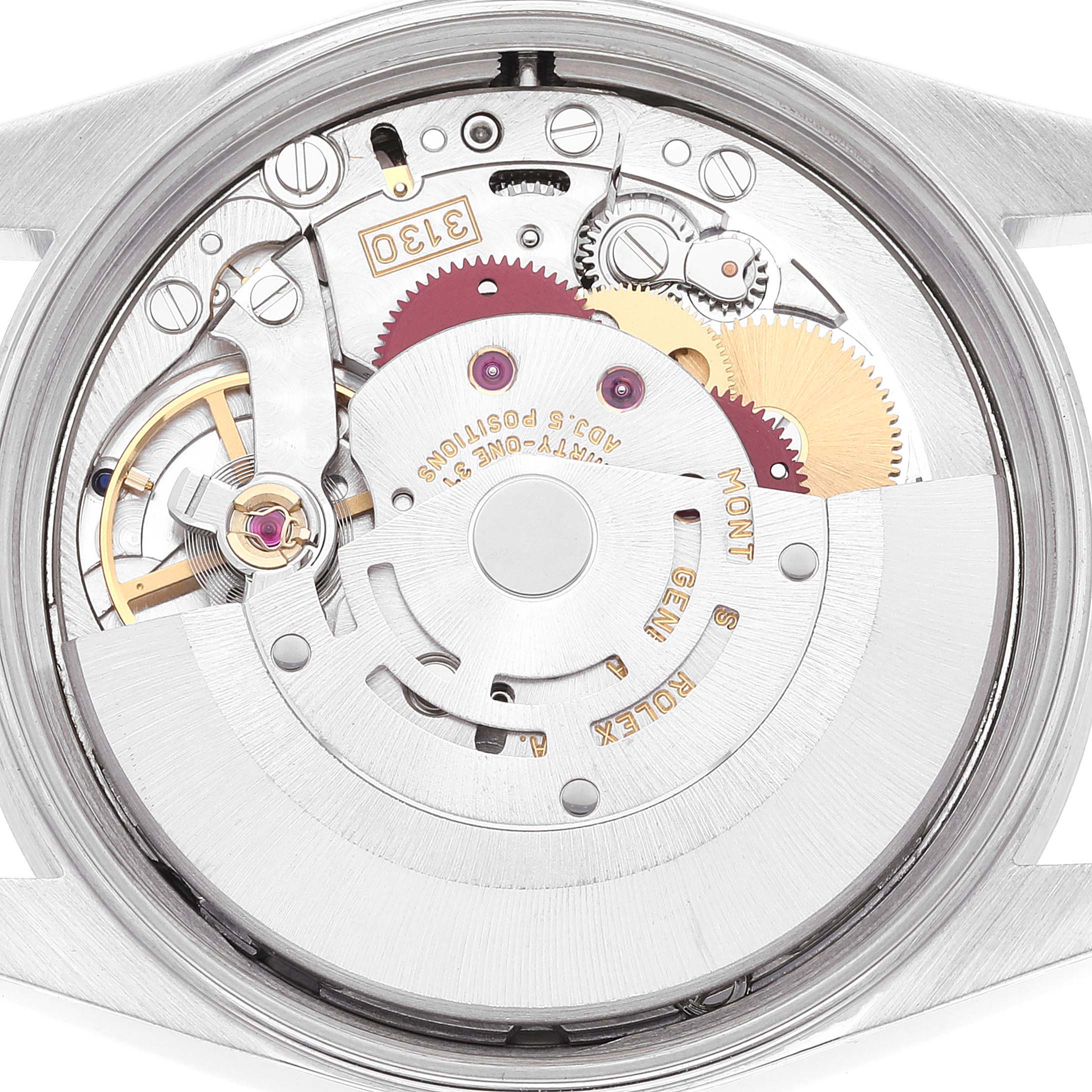 This image shows the interior mechanical components of the Rolex Air-King 14010 Men's Stainless Steel Silver Dial 14010 Men's Stainless Steel Silver Dial watch from a back angle with the case open.