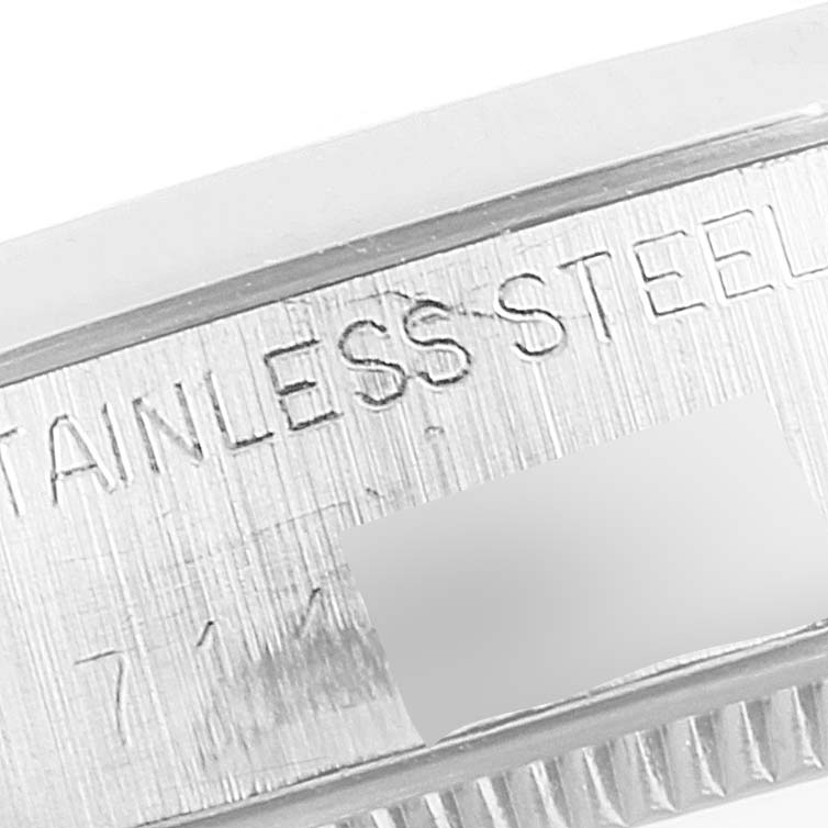 This image shows a close-up of the side engraving on a Rolex Vintage Collection 5500 Men's Stainless Steel Silver Dial 5500 Men's Stainless Steel Silver Dial watch, displaying "STAINLESS STEEL" and part of the model number.