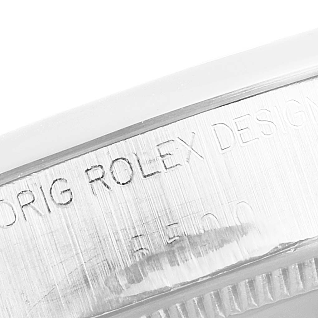 The image shows a close-up of the side of the bezel with etched text on the Rolex Vintage Collection 5500 Men's Stainless Steel Silver Dial 5500 Men's Stainless Steel Silver Dial model.