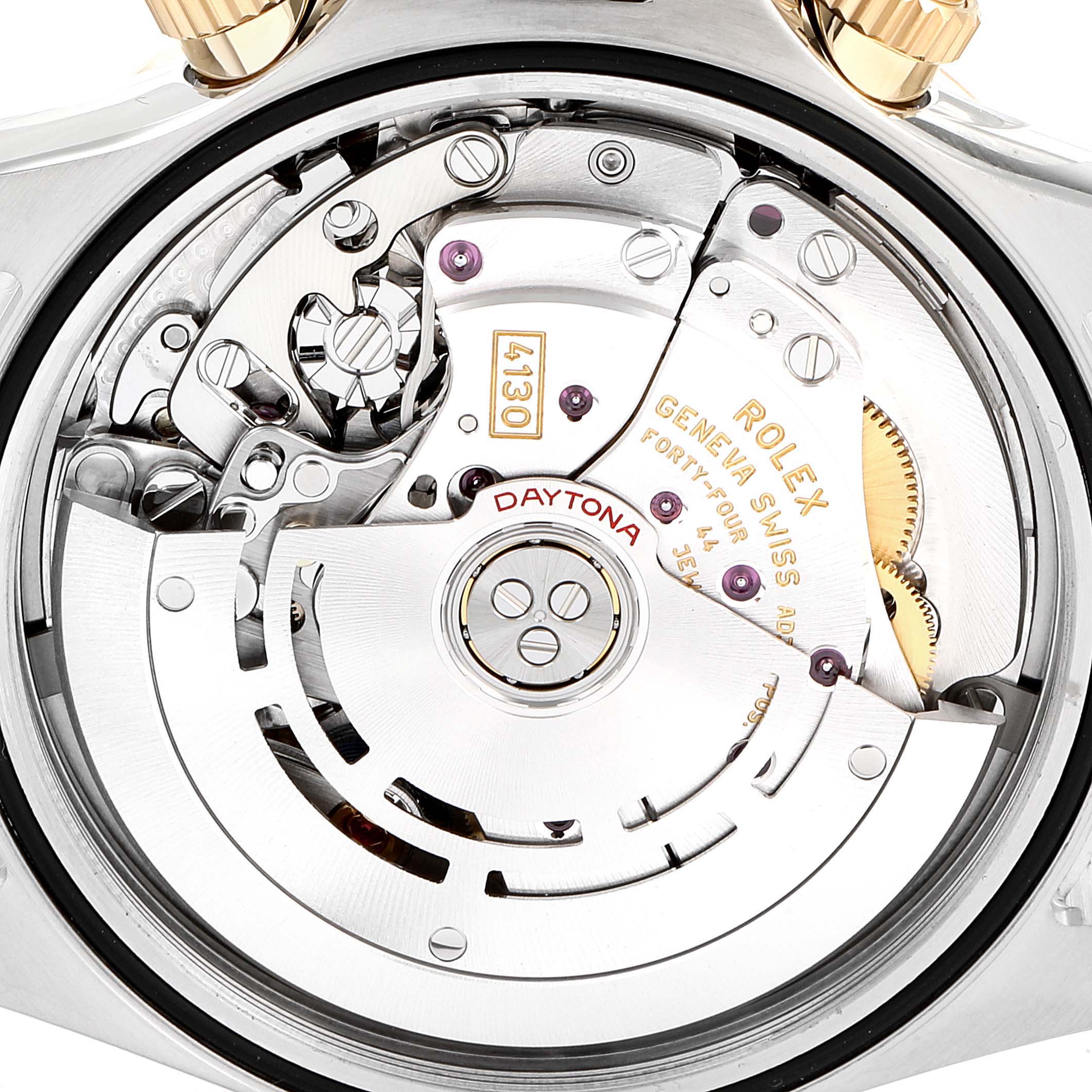 This image shows the inner workings and movement mechanism of a Rolex Daytona 116503 Men
s Steel and Gold (two tone) Champagne Dial 116503 Men
s Steel and Gold (two tone) Champagne Dial watch from a close-up, back angle.