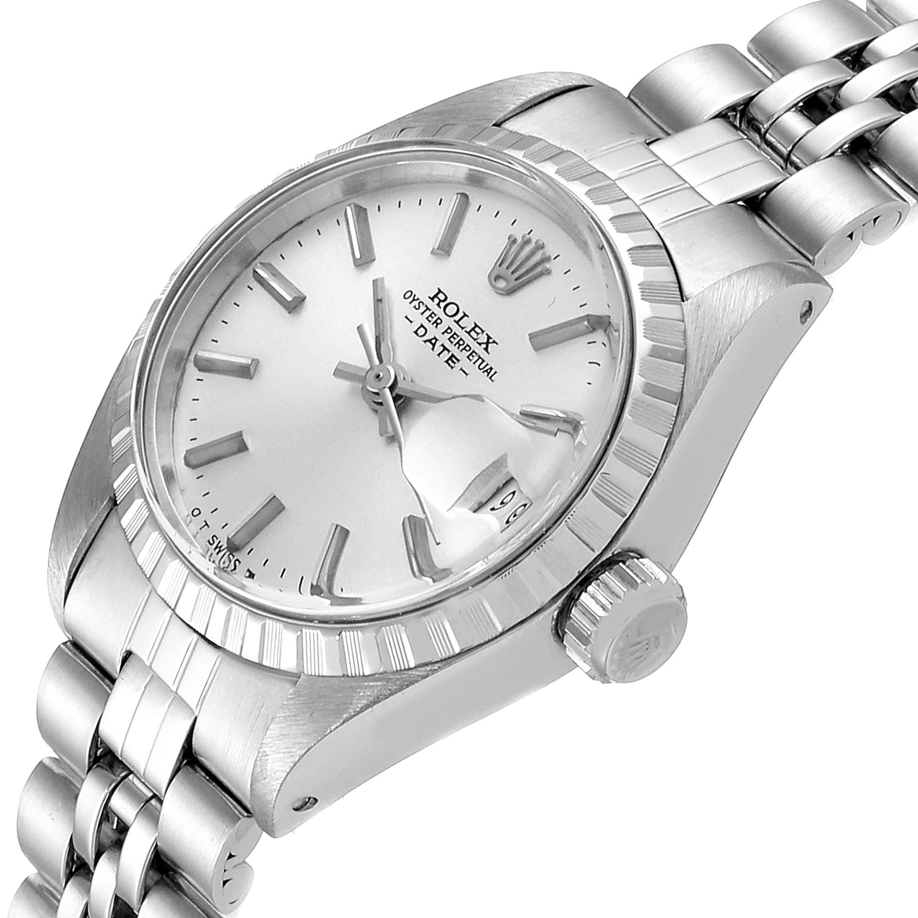 The image shows a close-up angle of the Rolex Date 6924 Women
s Stainless Steel Silver Dial 6924 Women
s Stainless Steel Silver Dial model watch, including the dial, crown, and part of the bracelet.