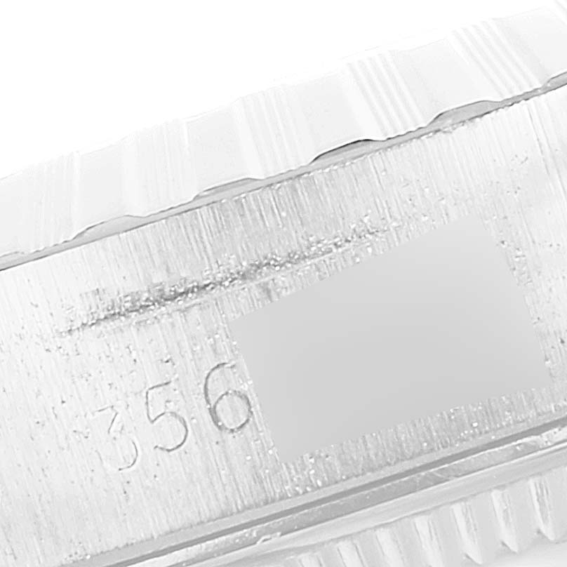 This image shows a close-up of the edge of the bezel and case with part of the serial number of a Rolex Date 6924 Women
s Stainless Steel Silver Dial 6924 Women
s Stainless Steel Silver Dial model watch.