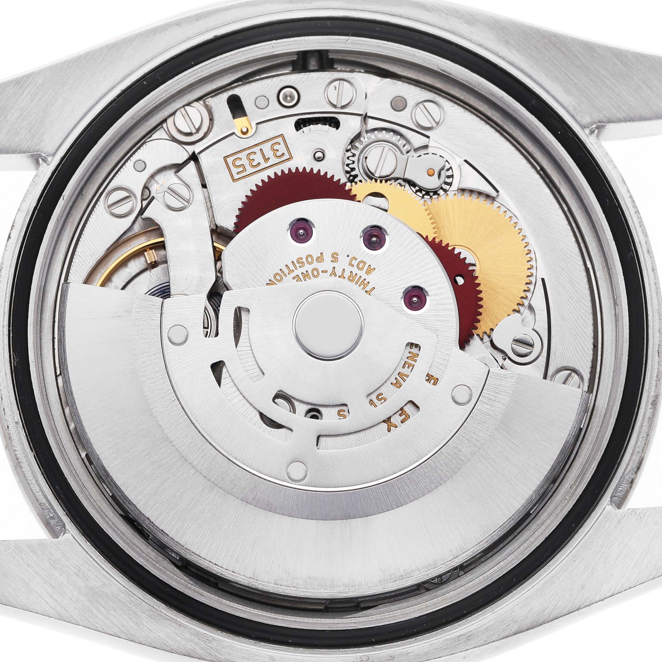The image shows a close-up view of the Rolex Datejust 116244 Men's Stainless Steel Silver Dial watch's movement, highlighting gears and the rotor mechanism.