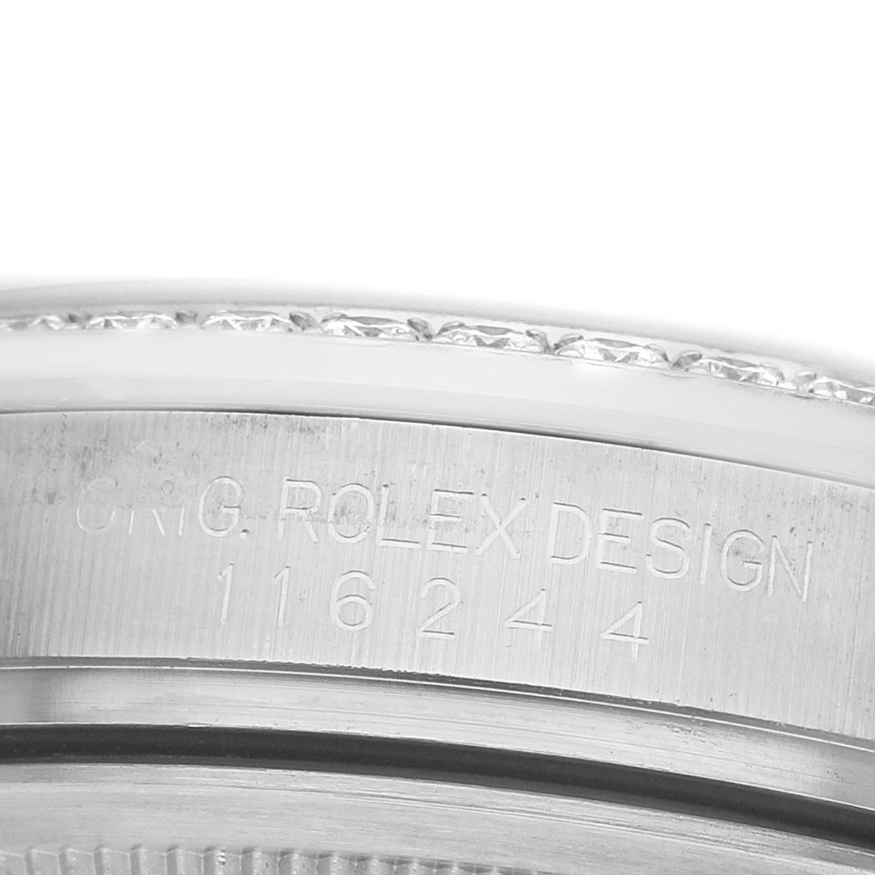 The image shows a close-up of the Rolex Datejust 116244 Men's Stainless Steel Silver Dial's side, focusing on the engraved model number and design.