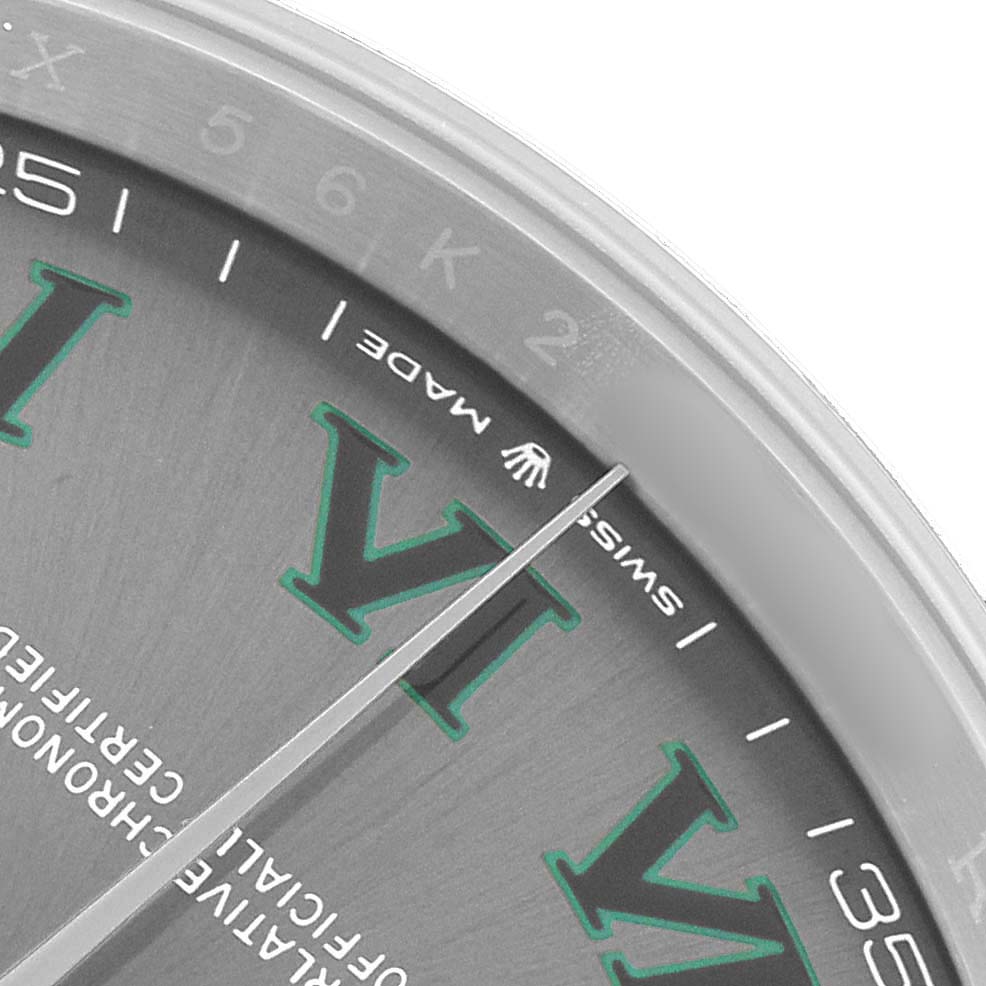 The image shows a close-up of the Rolex Datejust 41 126300 Men's Stainless Steel Grey Dial's dial, highlighting the Roman numerals and the "Swiss Made" text near the edge.