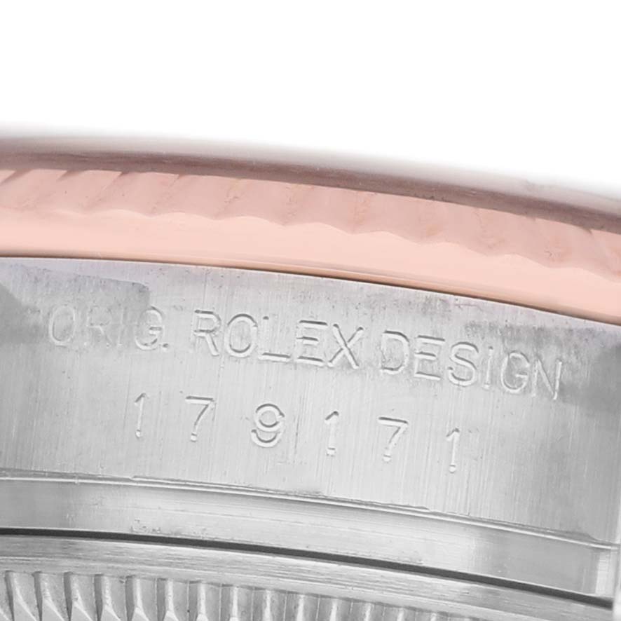 The image shows a close-up angle of the Rolex Datejust 179171 Women's Steel and Gold (two tone) Blue Dial's case side, highlighting the "Orig. Rolex Design" engraving.