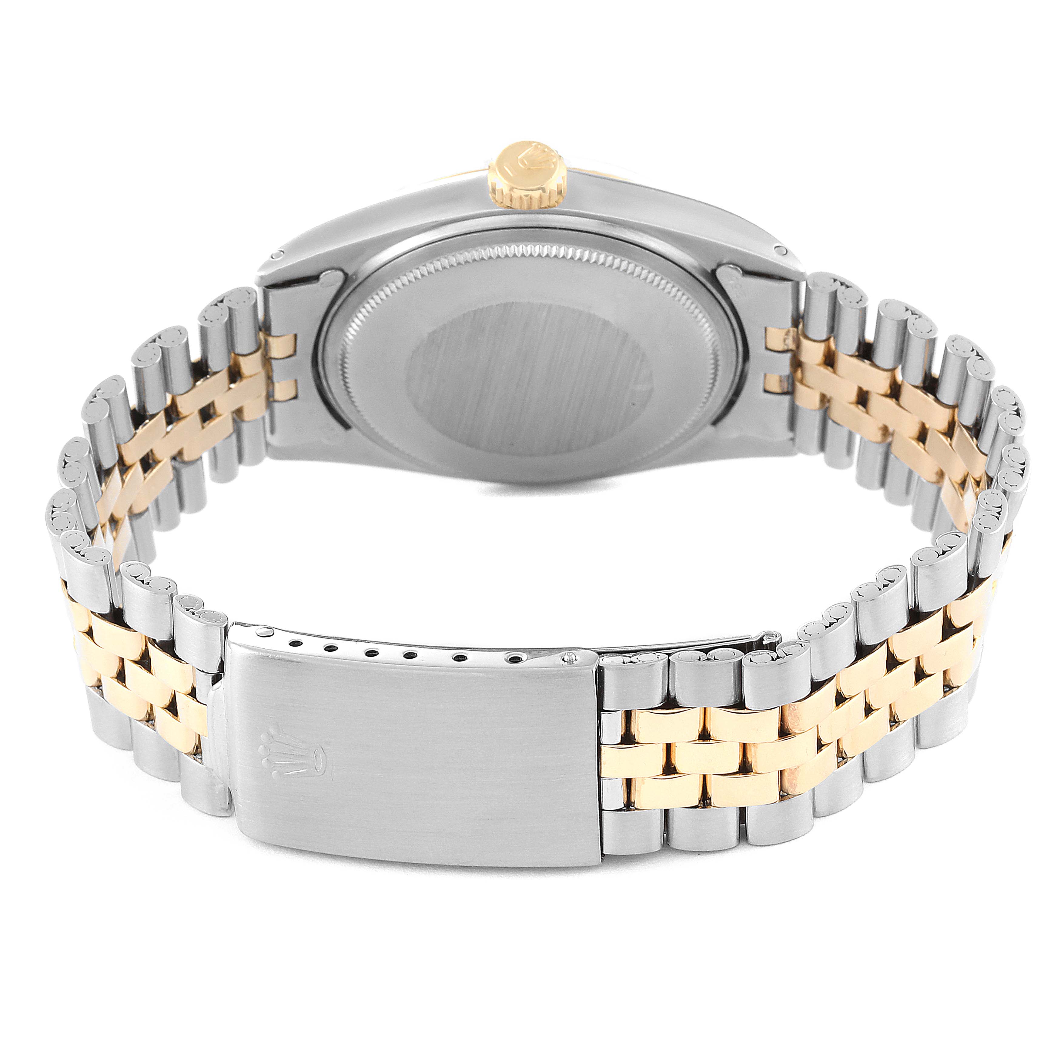 This image shows the back view of a Rolex Datejust 1601 Men's Steel and Gold (two tone) Champagne Dial 1601 Men's Steel and Gold (two tone) Champagne Dial watch, highlighting the case, crown, and two-tone bracelet with clasp.