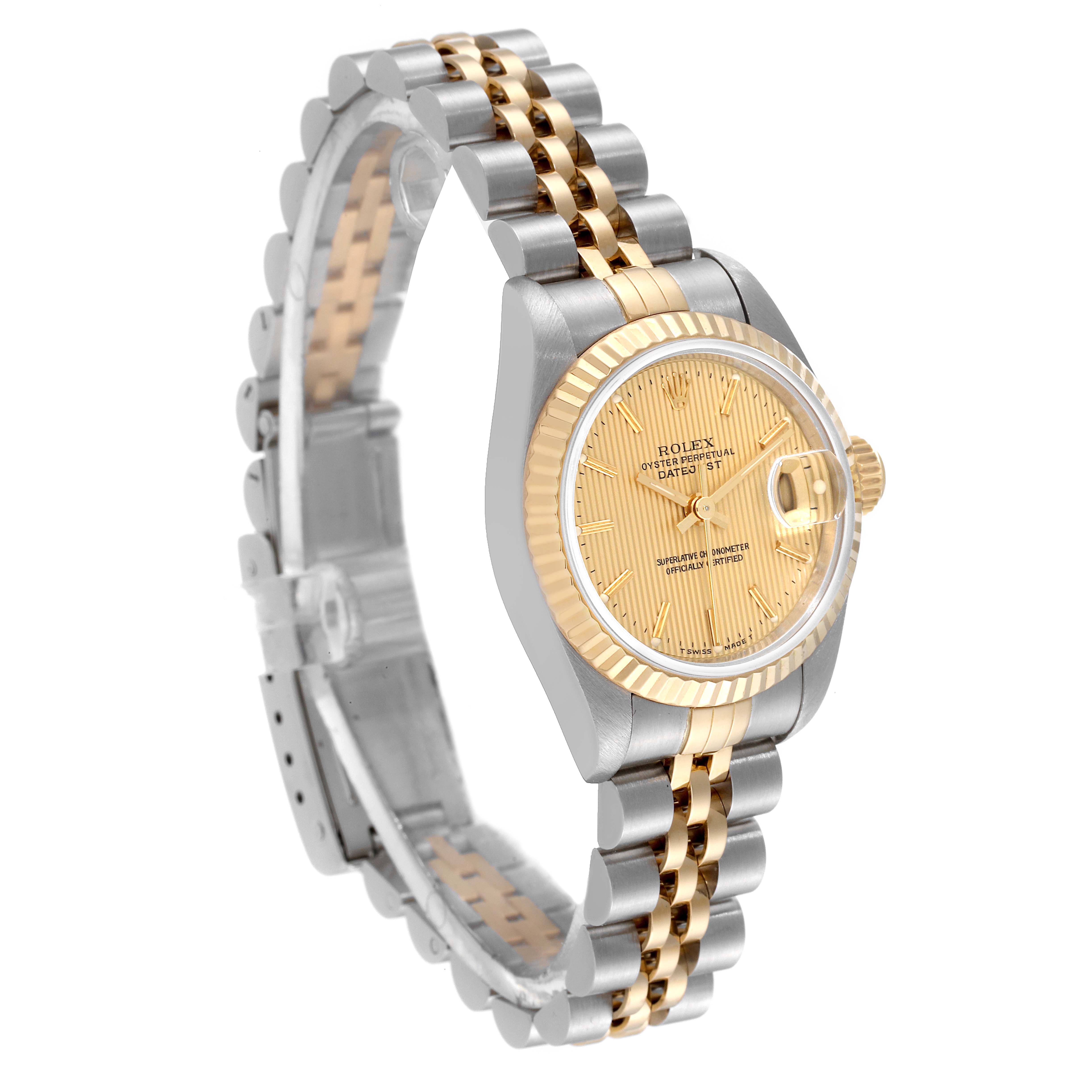 This Rolex Datejust 69173 Women's Steel and Gold (two tone) Champagne Dial 69173 Women's Steel and Gold (two tone) Champagne Dial watch is shown at an angle highlighting the face, bezel, and two-tone metal bracelet.