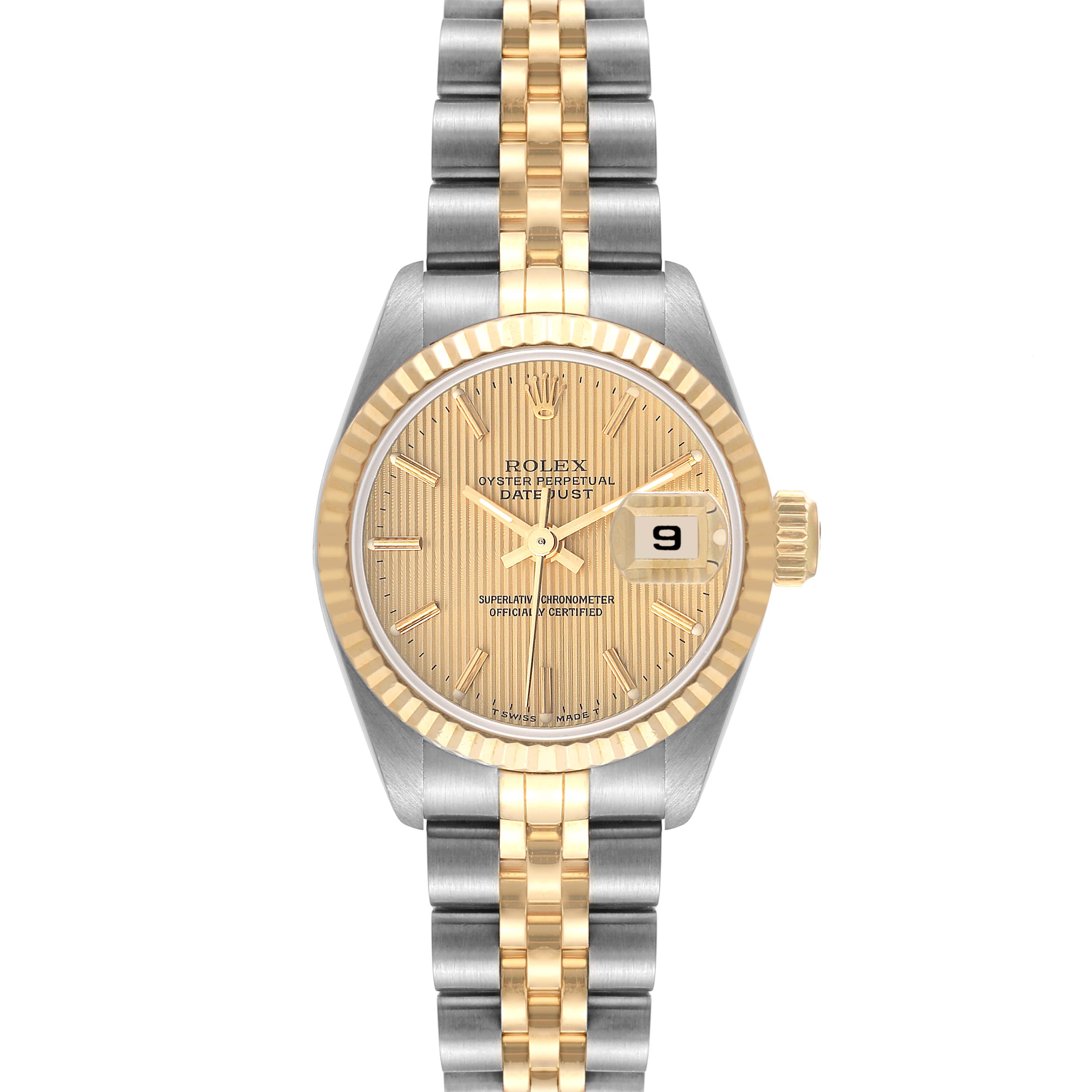 This image shows a Rolex Datejust 69173 Women's Steel and Gold (two tone) Champagne Dial 69173 Women's Steel and Gold (two tone) Champagne Dial model watch from a front angle, highlighting its gold and silver bracelet, fluted bezel, and date window.