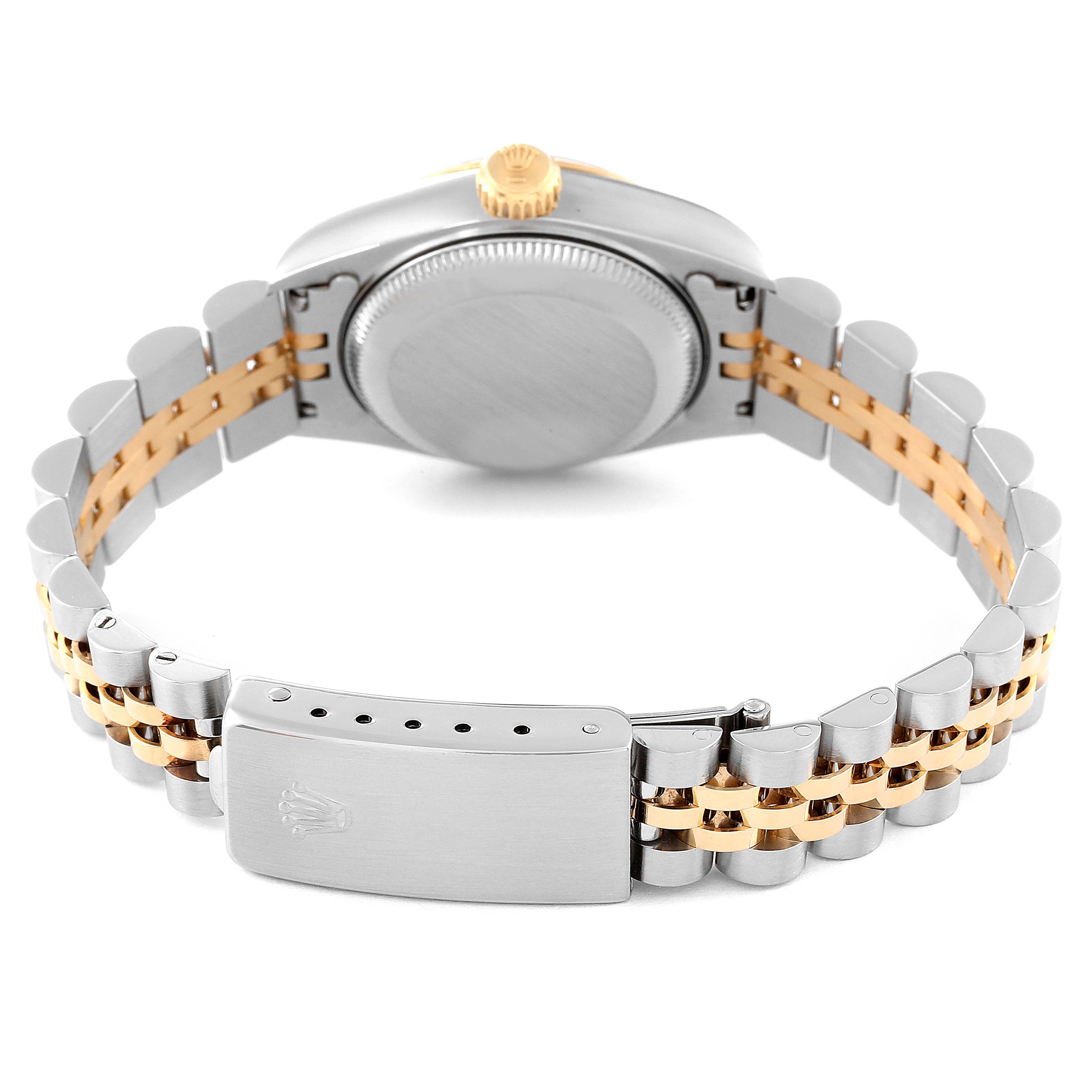 This angle shows the back of the Rolex Datejust 69173 Women's Steel and Gold (two tone) Champagne Dial 69173 Women's Steel and Gold (two tone) Champagne Dial watch, highlighting the case back, crown, and two-tone bracelet with the clasp.