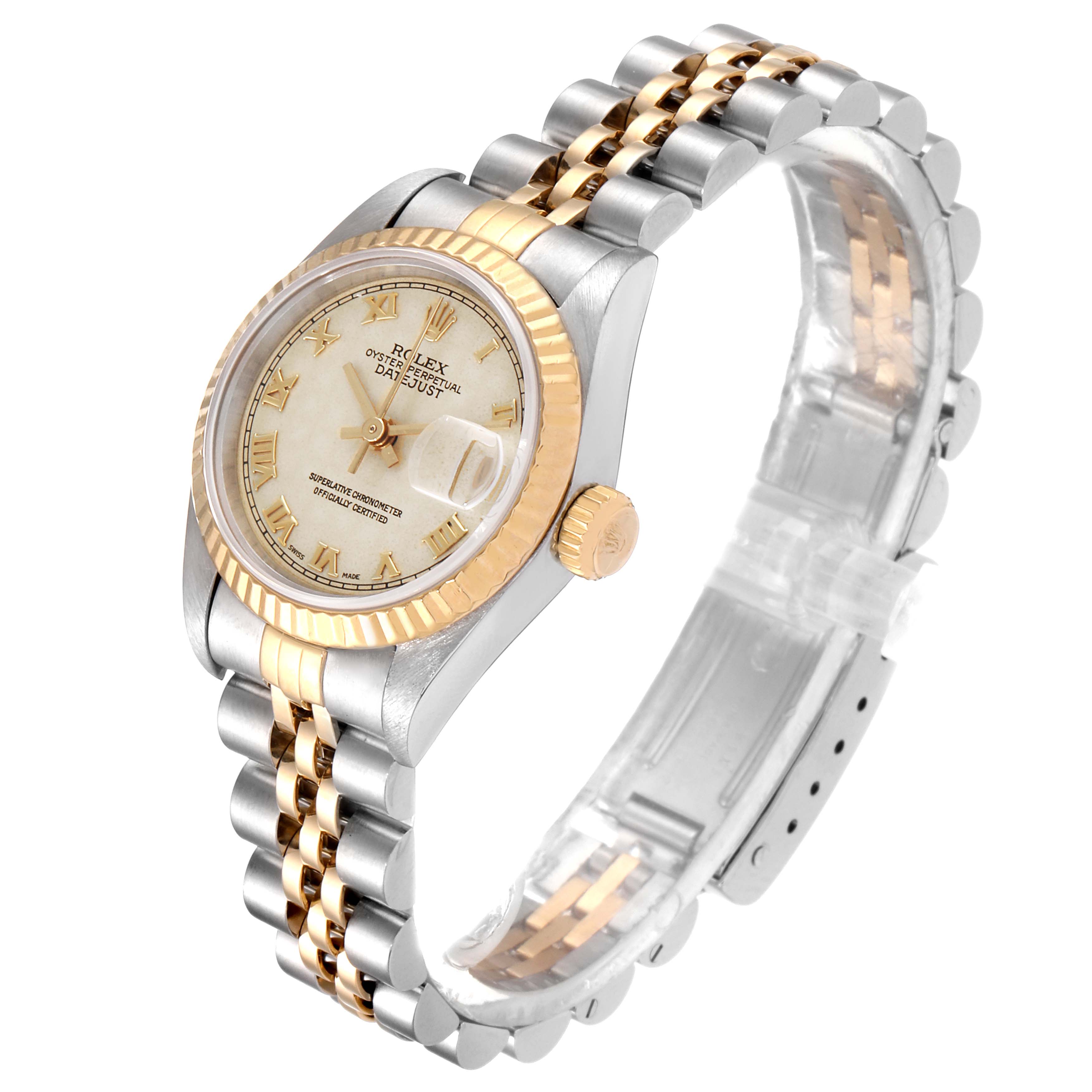 This image shows a Rolex Datejust 69173 Women's Steel and Gold (two tone) Beige Dial 69173 Women's Steel and Gold (two tone) Beige Dial watch at an angled view, highlighting its dial, bezel, crown, and bracelet.