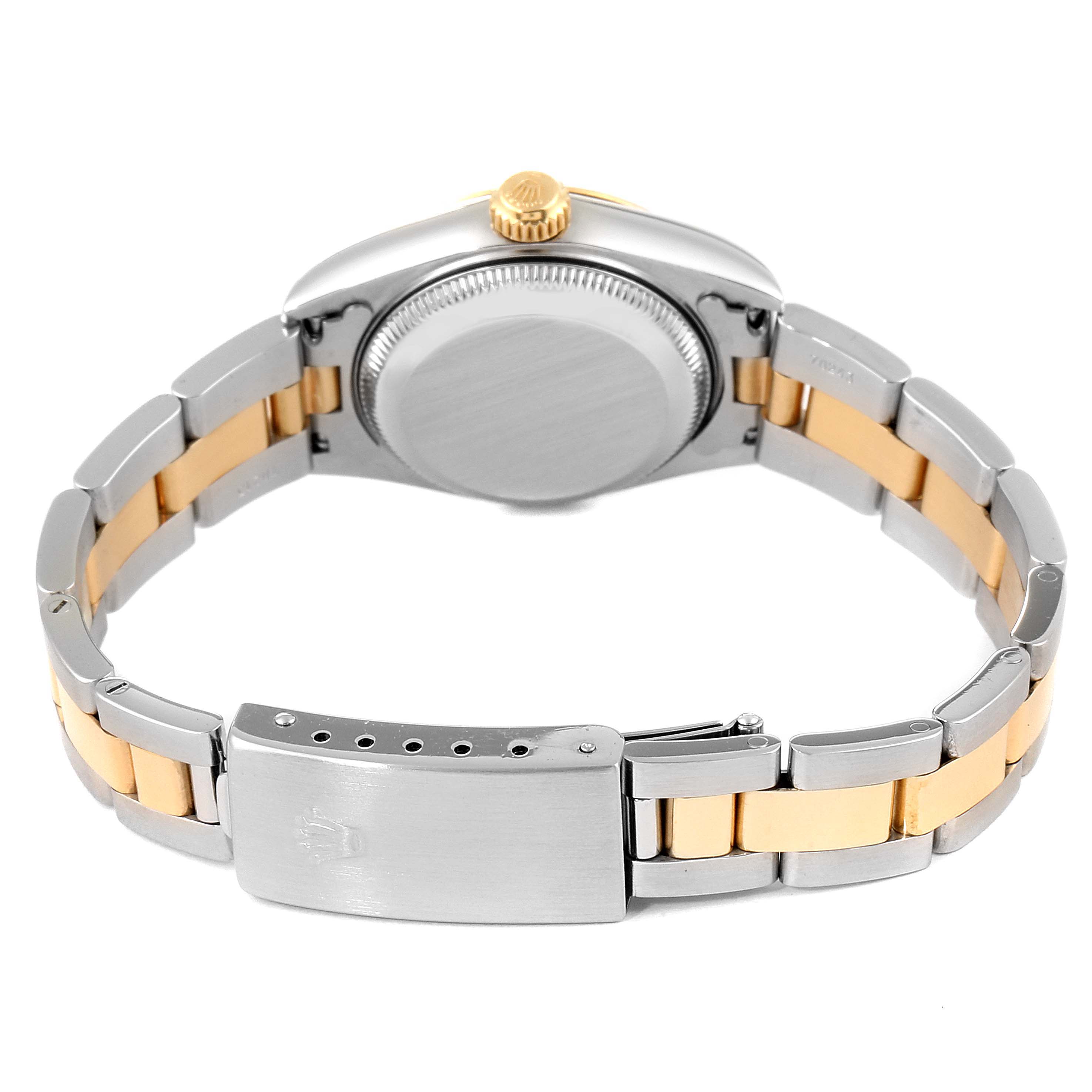 The image shows the backside of a Rolex Datejust 79163 Women's Steel and Gold (two tone) White Dial 79163 Women's Steel and Gold (two tone) White Dial watch, highlighting its two-tone bracelet and the watch's case back.