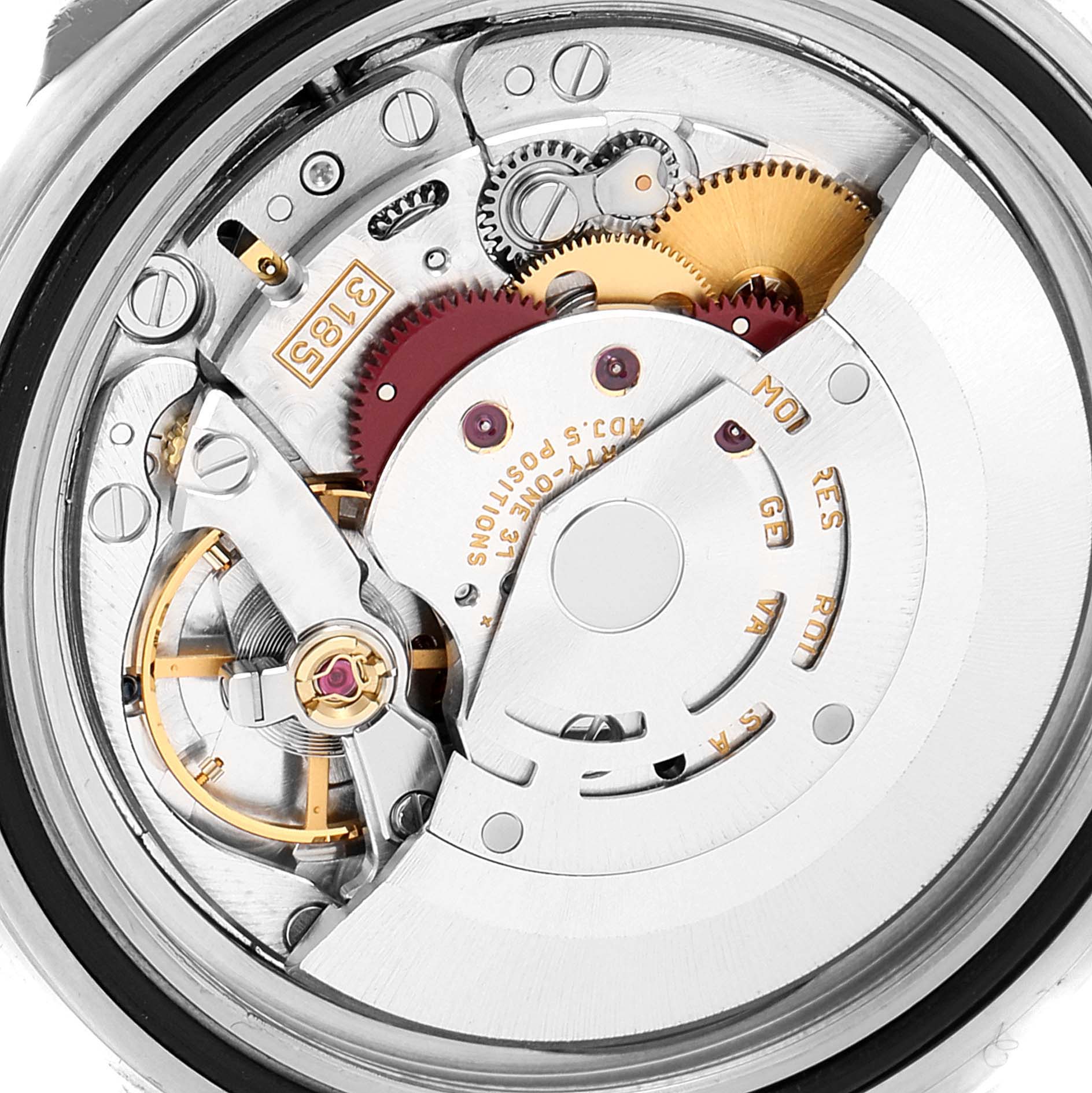 This image shows a close-up of the detailed movement mechanism inside a Rolex Explorer 16570 Men
s Stainless Steel White Dial 16570 Men
s Stainless Steel White Dial watch.
