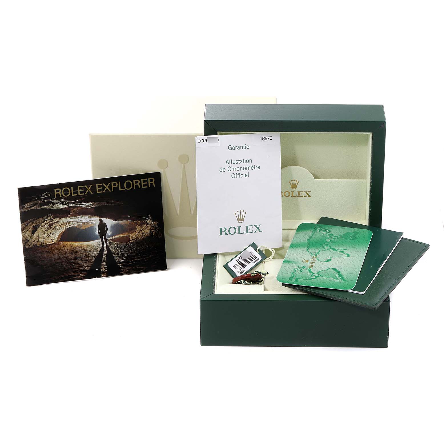 The image shows the packaging and documentation for the Rolex Explorer 16570 Men
s Stainless Steel White Dial 16570 Men
s Stainless Steel White Dial watch, including a box, manual, and warranty card.
