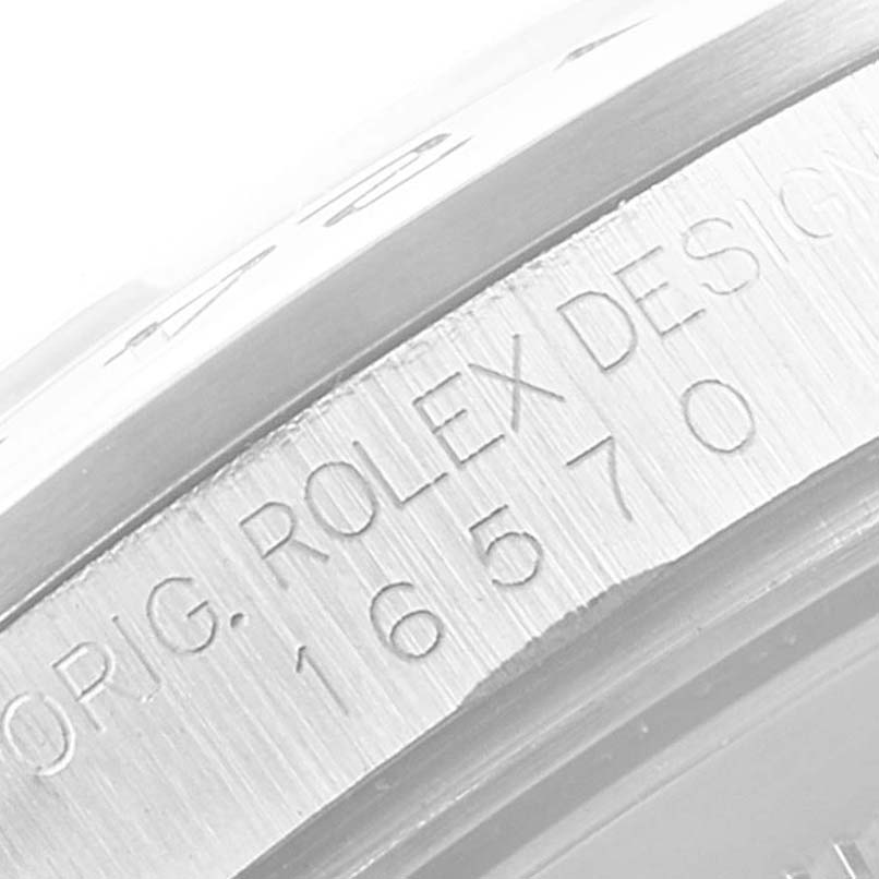 This image shows a close-up angle of the casing and engravings on a Rolex Explorer 16570 Men
s Stainless Steel White Dial 16570 Men
s Stainless Steel White Dial watch.