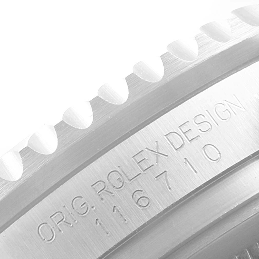 This close-up image shows the edge of the bezel and the model number engraving of a Rolex GMT-Master 116710 Men
s Stainless Steel Black Dial 116710 Men
s Stainless Steel Black Dial.