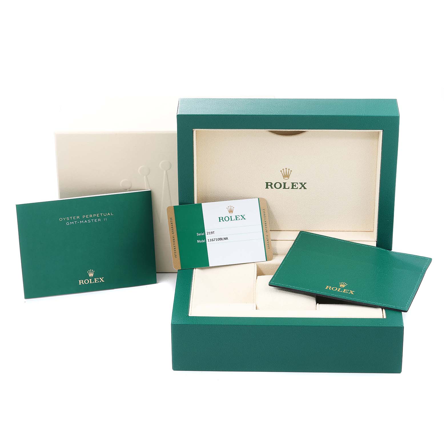 This image shows the packaging and accessories for a Rolex GMT-Master 116710 Men
s Stainless Steel Black Dial 116710 Men
s Stainless Steel Black Dial II, including the box, warranty card, and booklets.