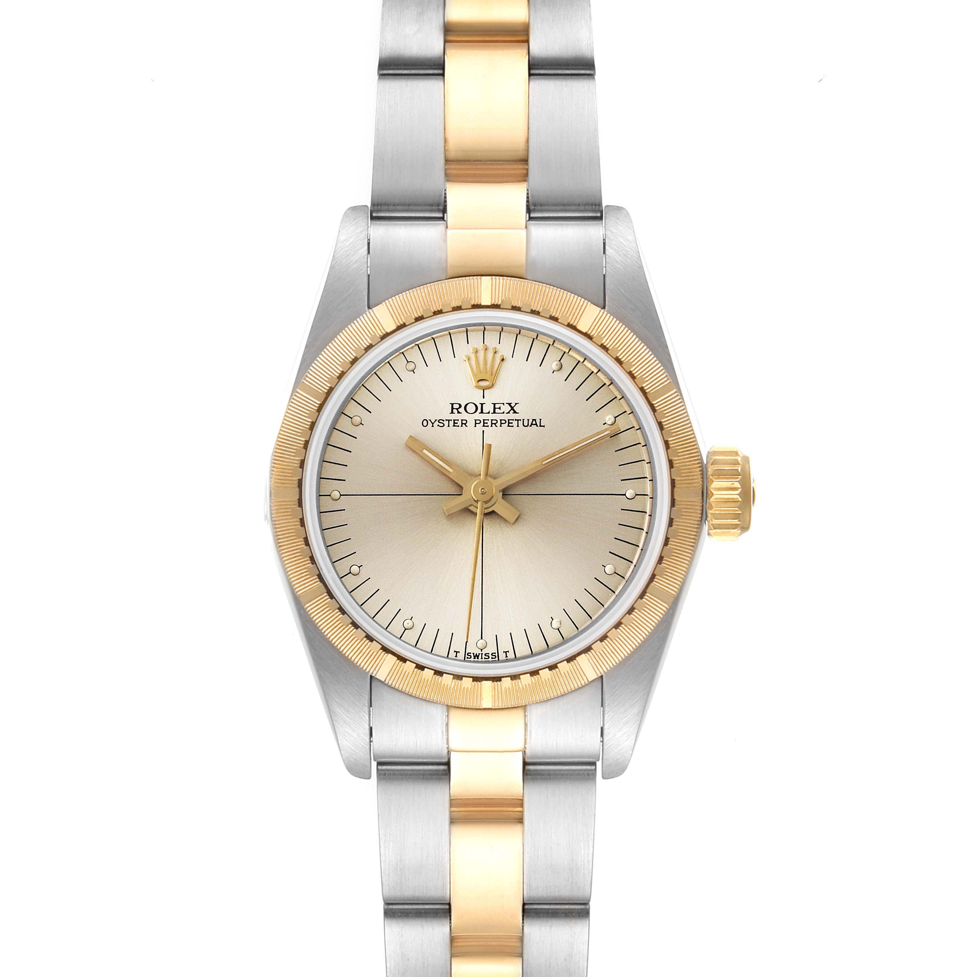This image shows a frontal view of the Rolex Oyster Perpetual 67243 Women's Steel and Gold (two tone) Silver Dial 67243 Women's Steel and Gold (two tone) Silver Dial watch, highlighting the dial, bezel, and bracelet.