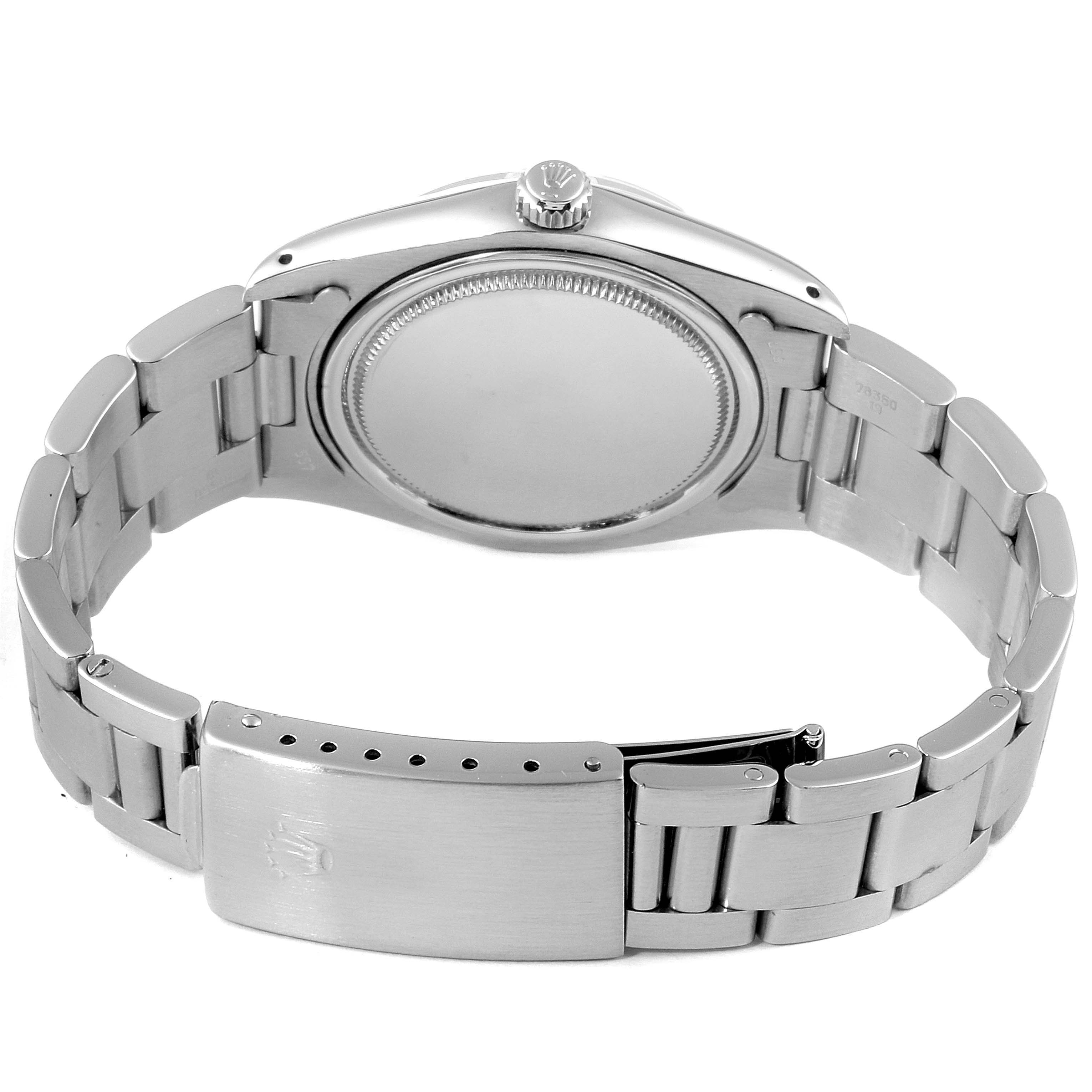 This image shows the back and clasp of a Vintage Collection Rolex watch from a rear angle.