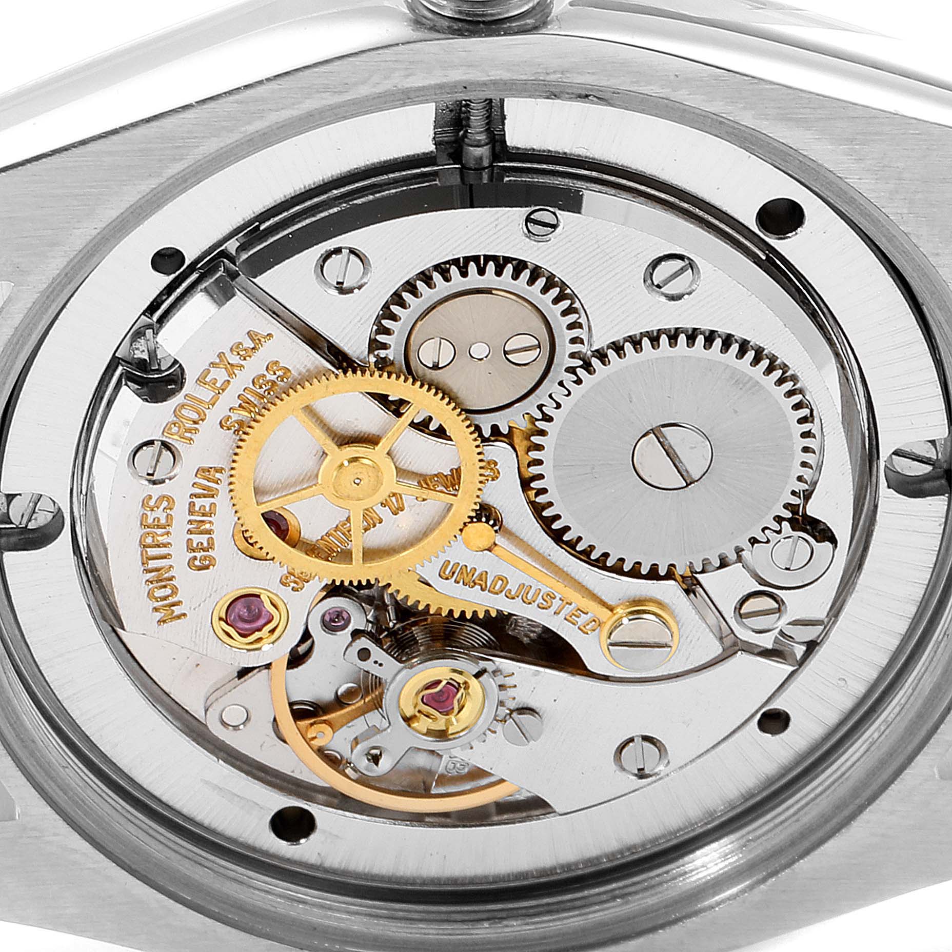 This image shows a close-up view of the intricate inner mechanism of the Vintage Collection Rolex watch.