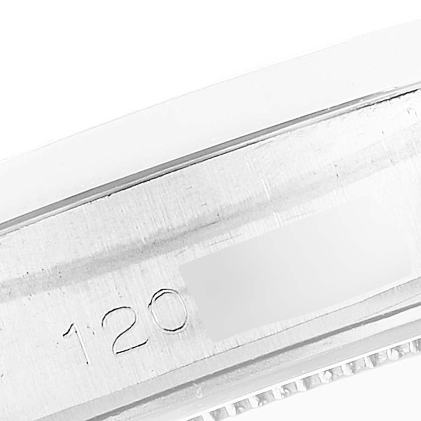 This close-up image shows the serial number area on the case rim of a Rolex Vintage Collection 6694 Men
s Stainless Steel Silver Dial 6694 Men
s Stainless Steel Silver Dial model watch.