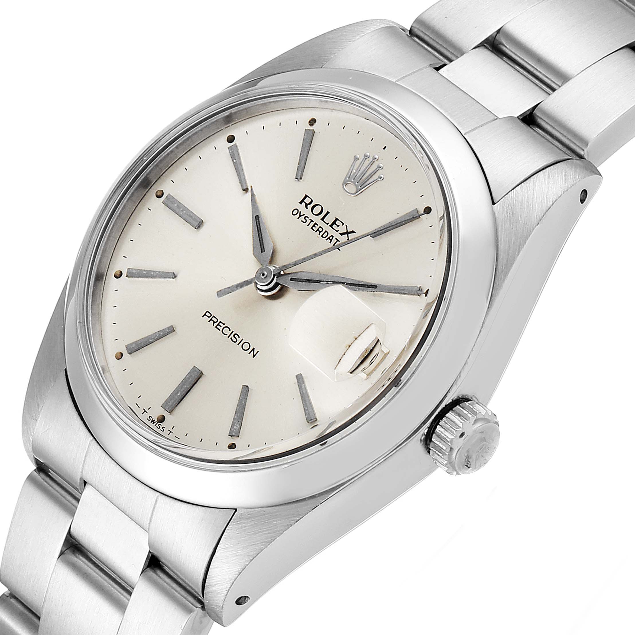 The Rolex Vintage Collection 6694 Men
s Stainless Steel Silver Dial 6694 Men
s Stainless Steel Silver Dial watch is shown at an angled close-up, featuring the dial, crown, and part of the band.