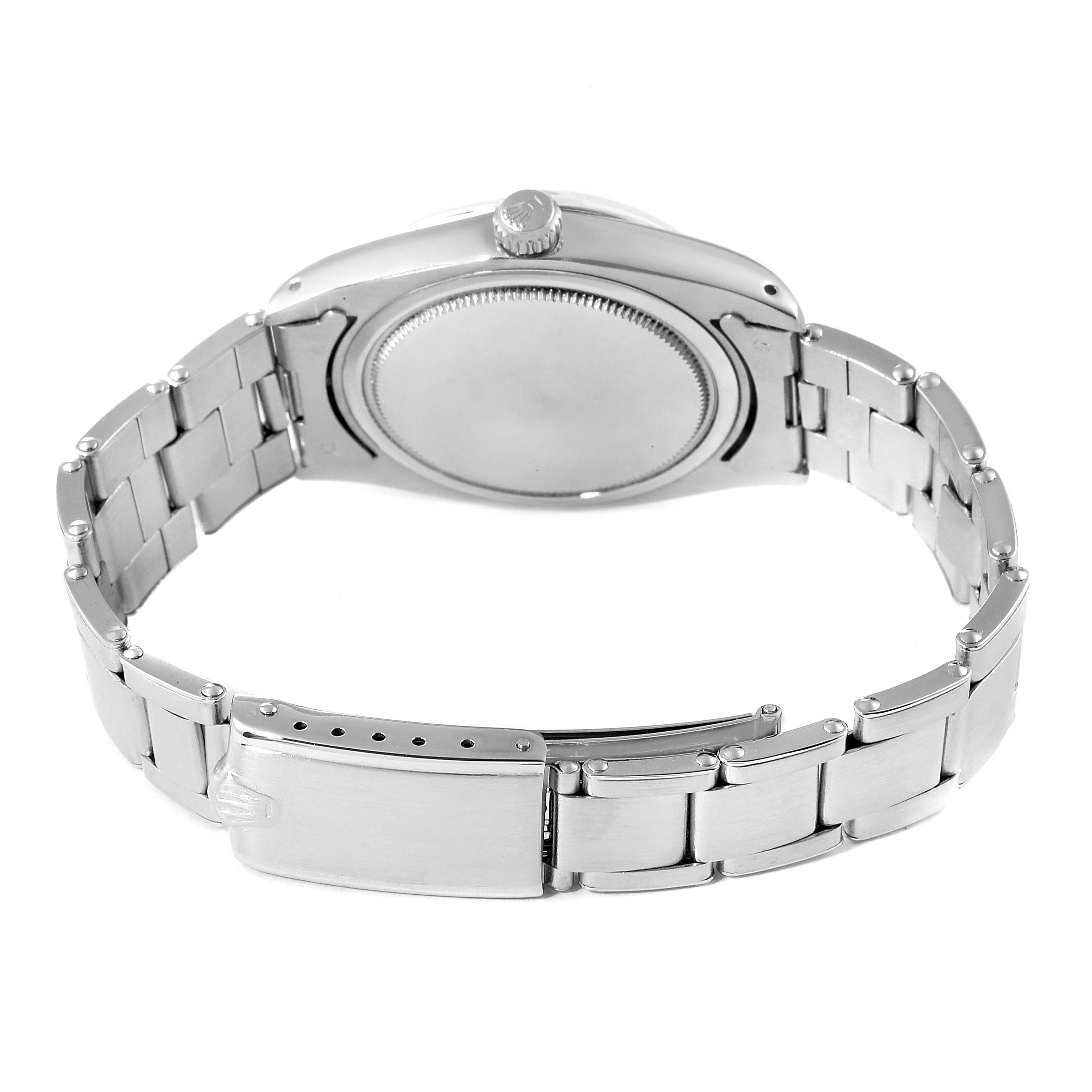 The image shows the back and bracelet of a Rolex Vintage Collection 6694 Men's Stainless Steel Silver Dial watch, including the case back, crown, and clasp.