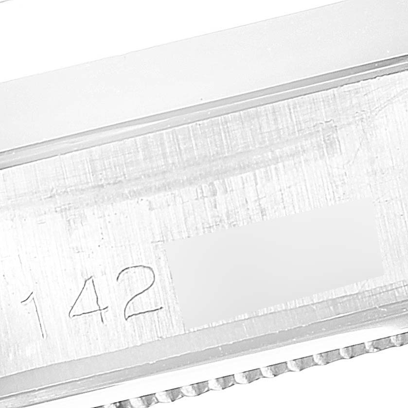 The image shows a close-up of the case part of a Vintage Collection Rolex watch, focusing on the engraved serial number.